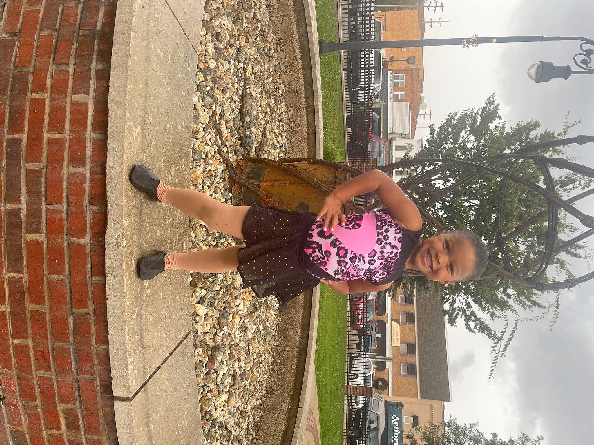 Juliahna is registered to the contest to win money with this photo: art, brick, brickwork, facade, fun, happy, human_leg, joy, leisure, magenta, pattern, person, plant, sidewalk, sky, street, street_fashion, thigh, tree, visual_arts