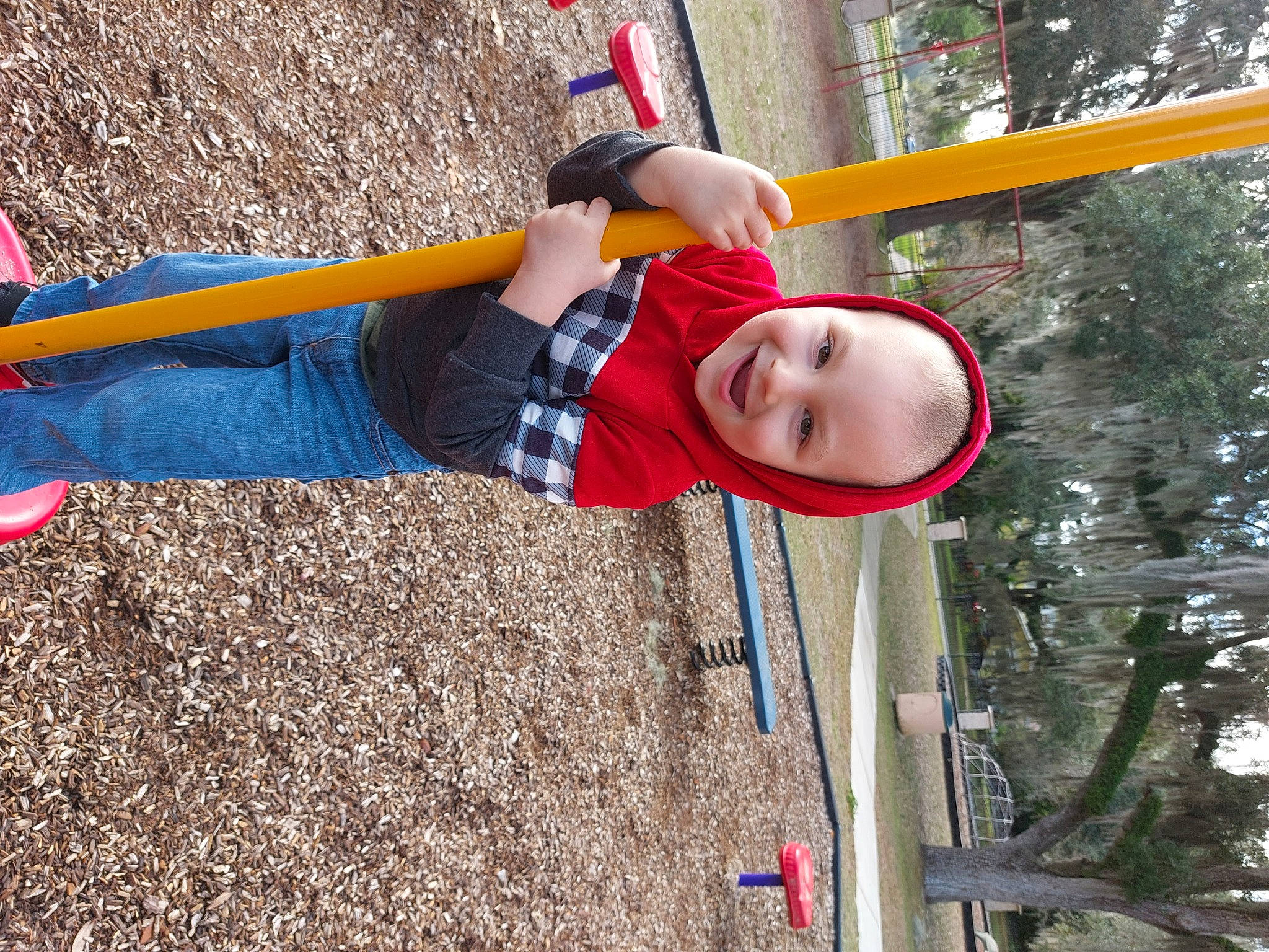 Jean-paul is registered to the contest to win money with this photo: balance, child, city, electric_blue, fun, hat, joy, leisure, outdoor_play_equipment, person, play, playground, recreation, smile, soil, swing, toddler, tree