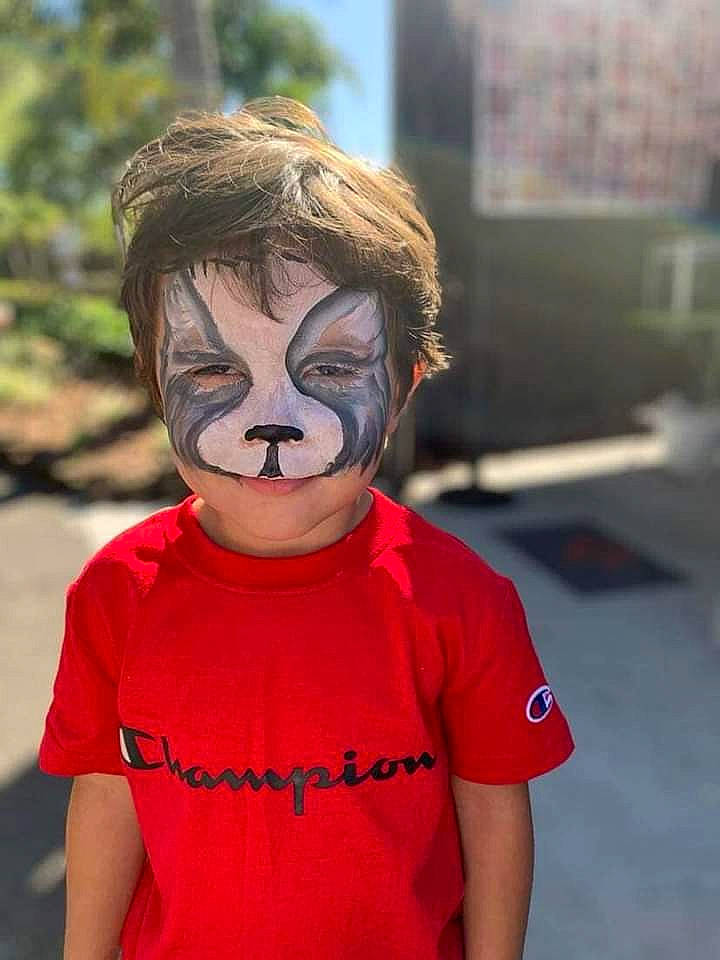 Karson is registered to the contest to win money with this photo: baby_toddler_clothing, child, costume, eyewear, fun, hairstyle, happy, leisure, mask, mouth, person, personal_protective_equipment, recreation, sleeve, sports_gear, t_shirt, toddler, tree, vacation, vision_care
