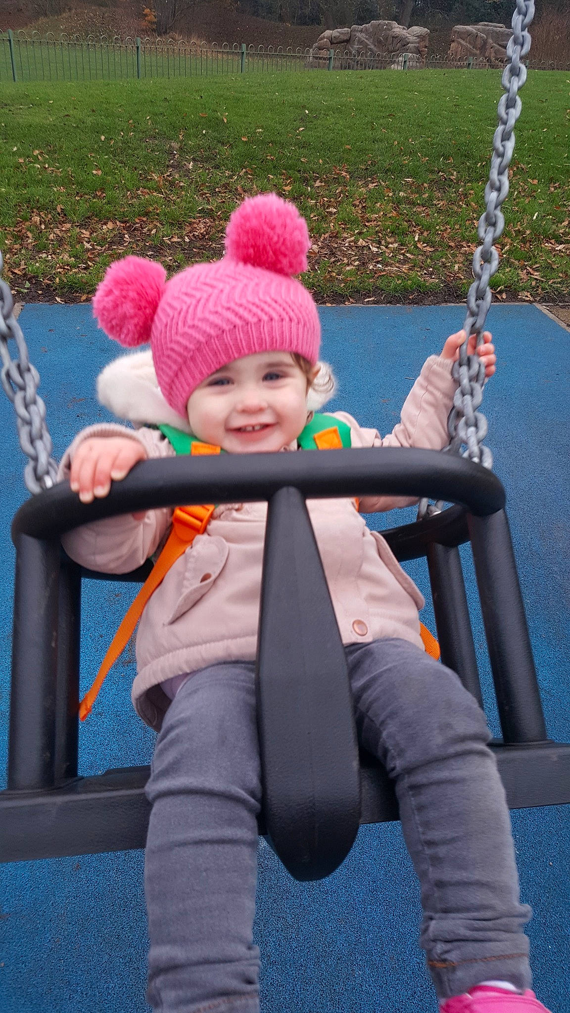 Clarissa Rose Lawrence is registered to the contest to win money with this photo: baby_products, beanie, cap, child, fun, girl, headgear, infant, joy, outdoor_play_equipment, person, pink, play, product, public_space, purple, smile, toddler, vacation