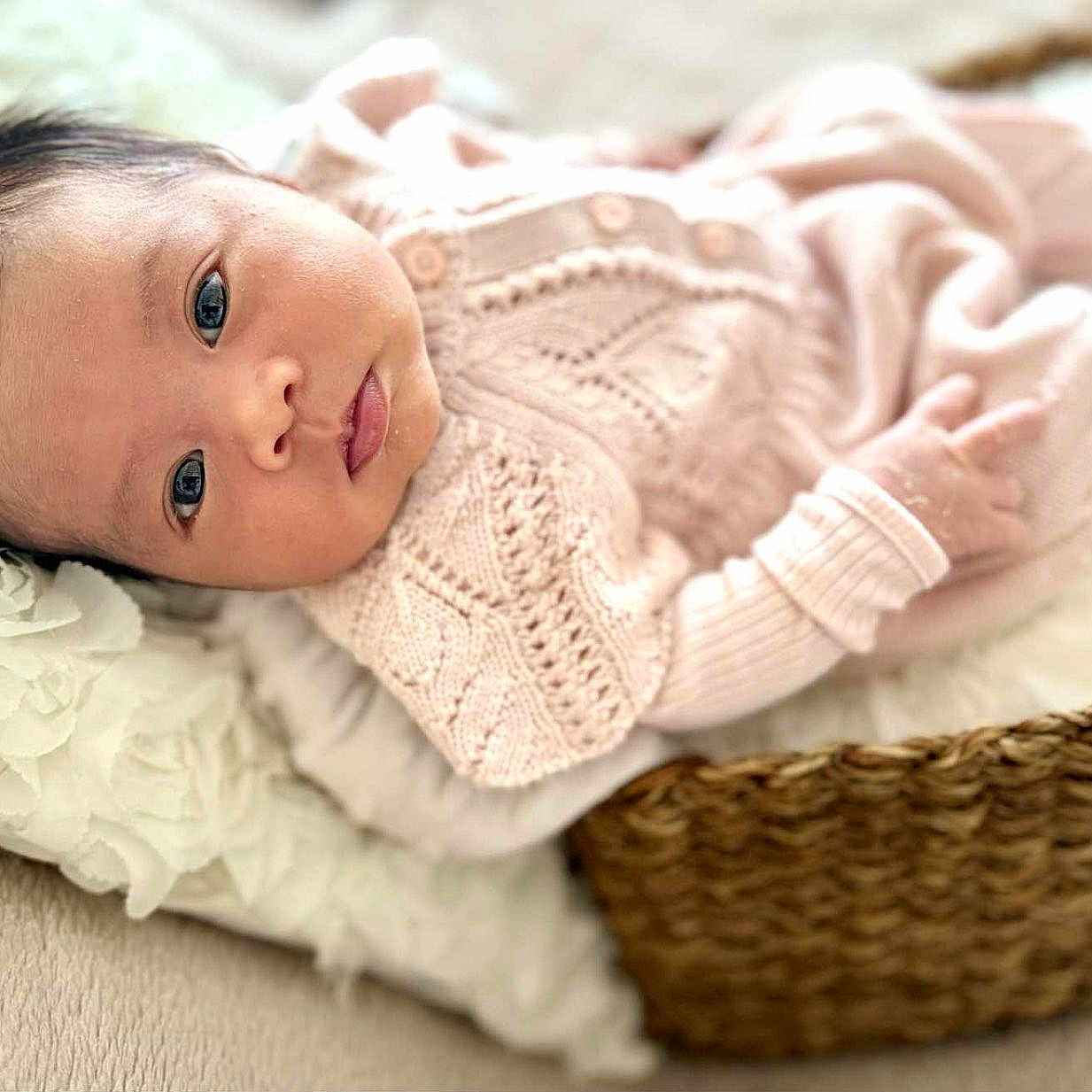 Lila Roslind joined the competition — help win amazing prizes! baby, basket, blanket, child, closeup, cozy, cute, eyes, fabric, face, indoor, infant, knitted_clothing, lying_down, newborn, peaceful, pink, portrait, soft_texture, woven
