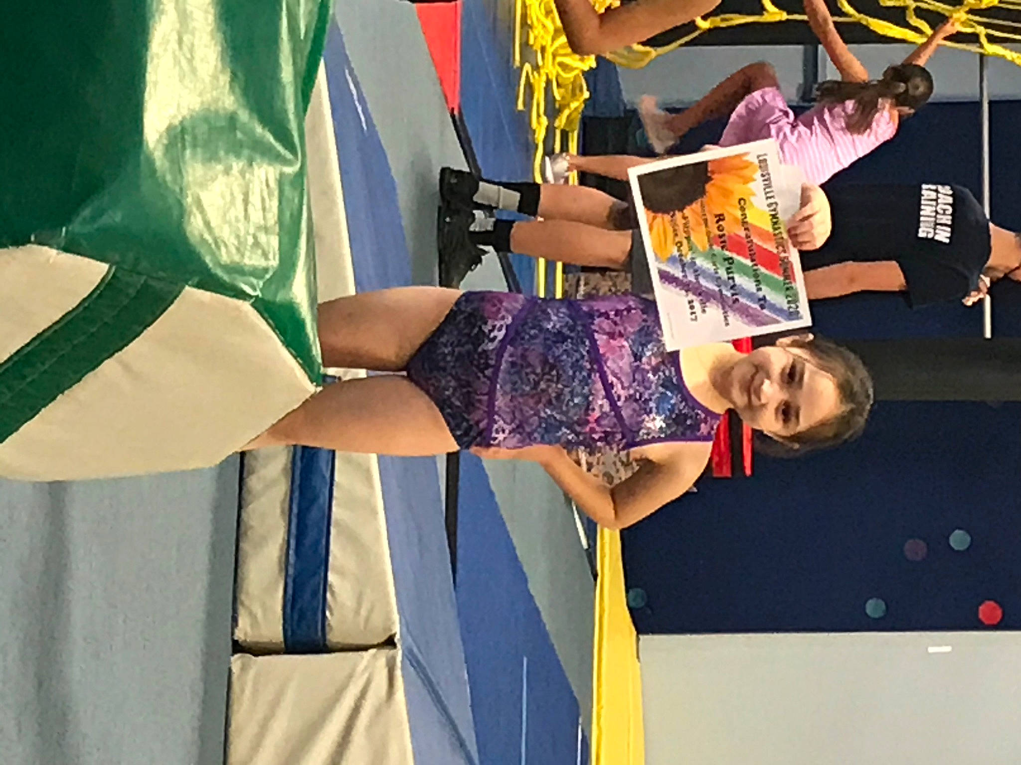 Rosie is registered to the contest to win money with this photo: advertising, arm, art, artist, dress, electric_blue, event, fashion, fashion_design, flag, fun, gesture, human_leg, joy, leisure, magenta, person, room, t_shirt, thigh