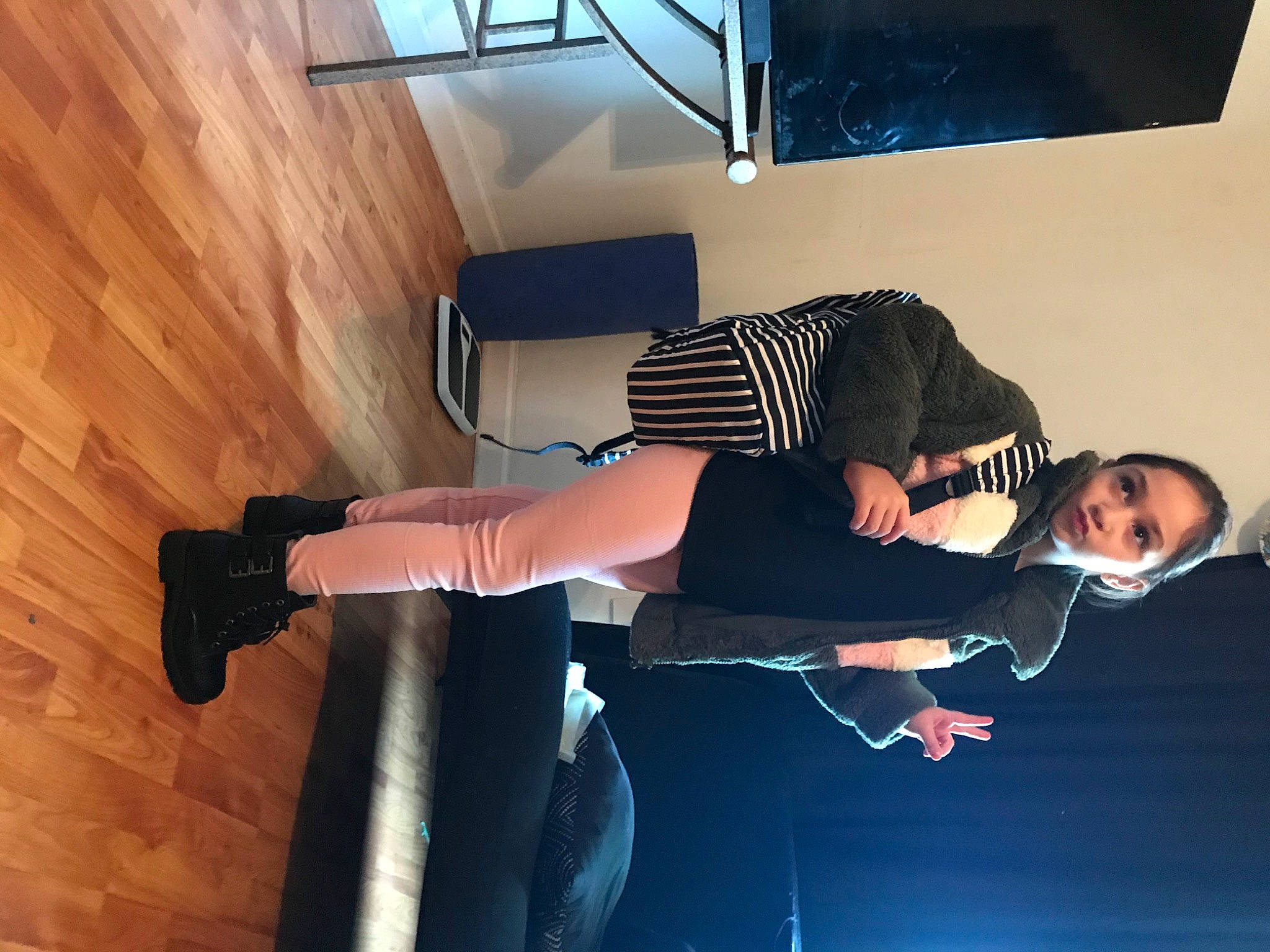 Rosie joined the competition — help win amazing prizes! comfort, elbow, eyewear, finger, flooring, fun, gesture, happy, hardwood, human_leg, knee, leisure, person, room, shoulder, stairs, thigh, tints_and_shades, walking_shoe, wood