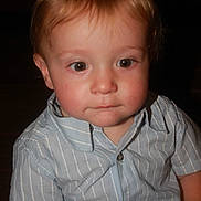 Ezekiel is registered to the contest to win money with this photo: child, toddler, face, portrait, clothing, shirt, striped, blue, eyes, hair, baby, cute, young, person, indoor, skin, expression, head, human, casual