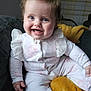 baby, babylaughing, bodypart, clothing, couch, cushion, face, finger, furniture, hand, happy, head, homedecor, laughing, pants, person, photography, portrait, sitting, smile