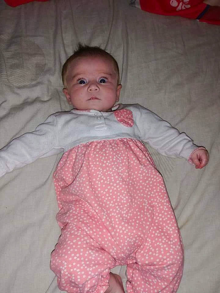 Hallie is registered to the contest to win money with this photo: baby, baby_toddler_clothing, cheek, child, eye, iris, person, pink, skin, toddler