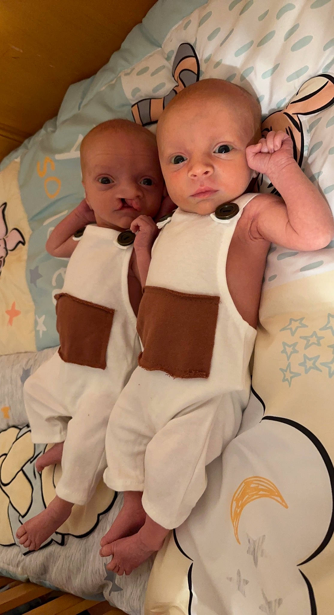 Hendryx And Ryker is registered to the contest to win money with this photo: baby, baby_toddler_clothing, cheek, child, comfort, face, finger, gesture, happy, head, linens, person, pink, product, skin, sleeve, stomach, textile, thumb, toddler