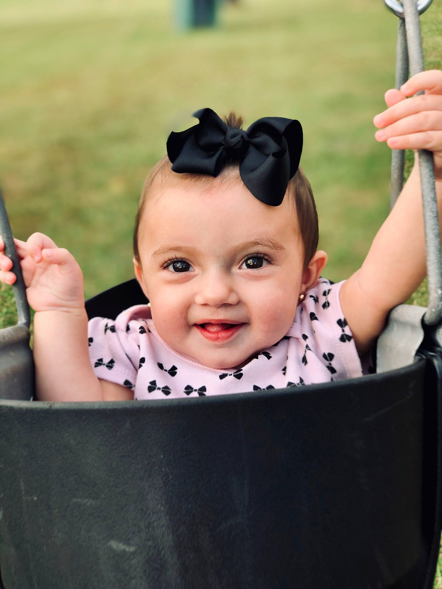 Madalynn joined the competition — help win amazing prizes! baby, baby_products, black_hair, cheek, child, hairstyle, joy, person, product, smile, swing, toddler