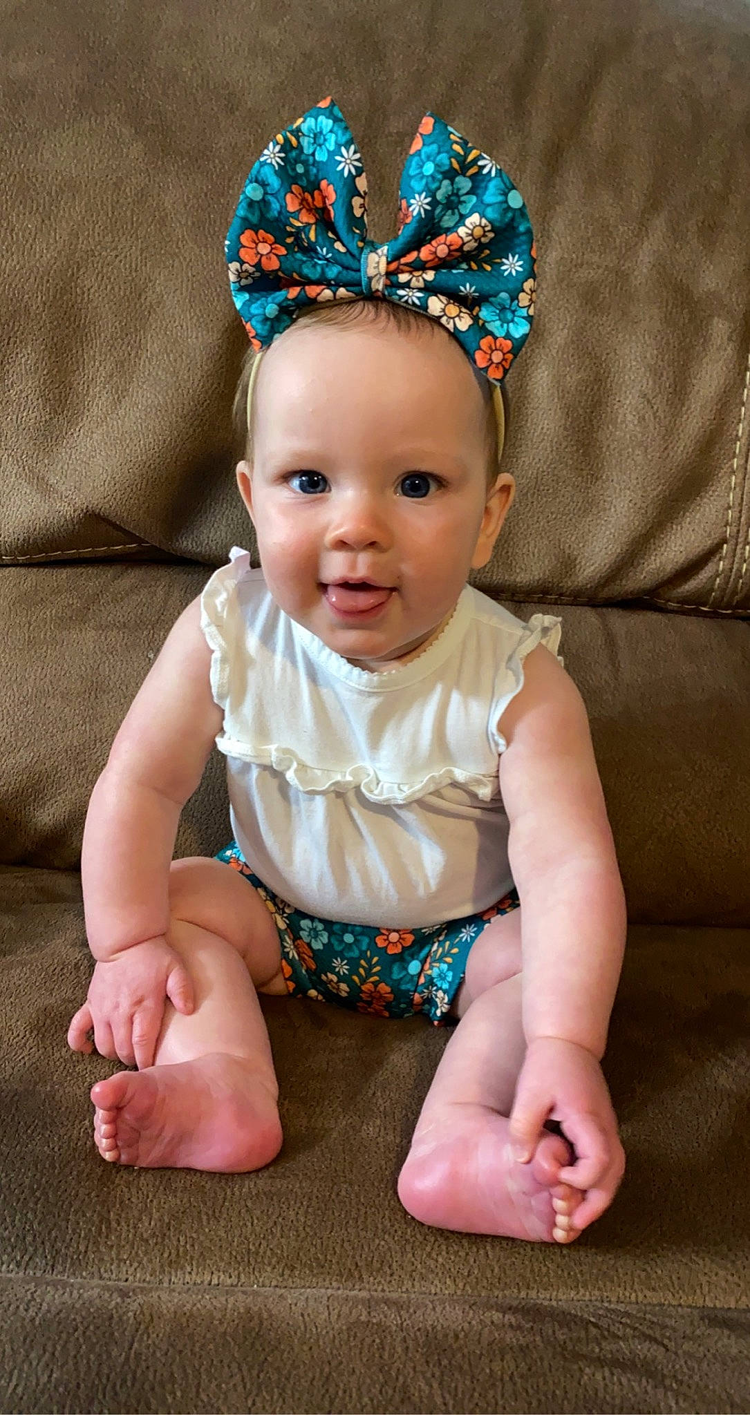 Lailah joined the competition — help win amazing prizes! baby, baby_toddler_clothing, blue, cap, cheek, chin, clothing, costume_hat, dress, eye, face, hairstyle, happy, head, headpiece, iris, person, pink, skin, sleeve