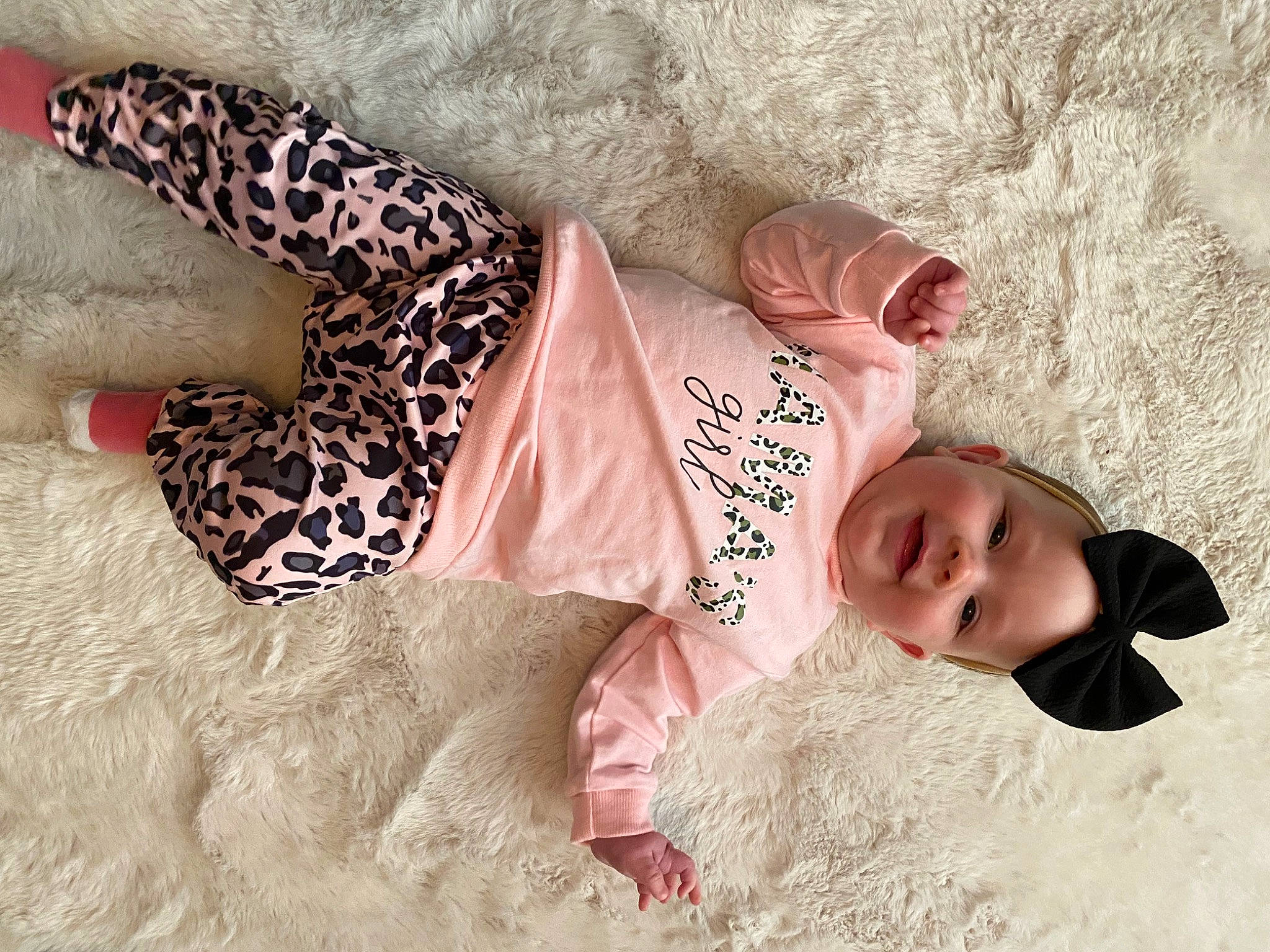 Lailah is registered to the contest to win money with this photo: baby, baby_toddler_clothing, beauty, child, comfort, fawn, felidae, happy, head, human_body, joy, leg, linens, mammal, neck, person, skin, sleeve, textile, toddler