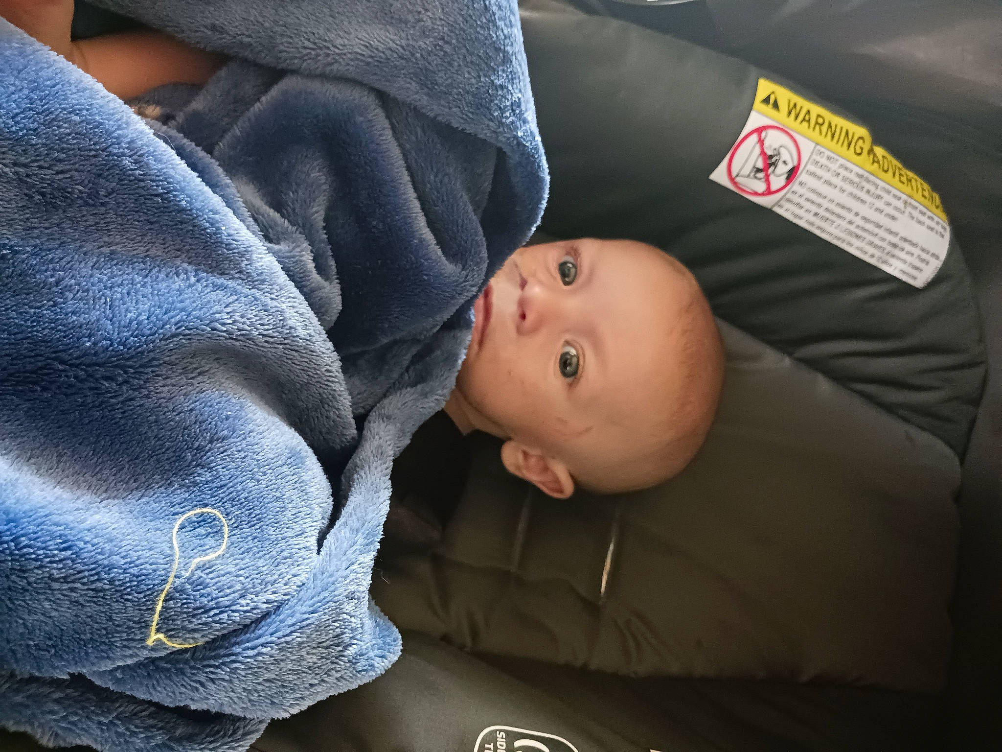 Conway is registered to the contest to win money with this photo: baby, baby_carriage, baby_products, baby_safety, baby_toddler_clothing, car_seat, child, comfort, denim, electric_blue, grey, linens, person, polar_fleece, product, sleeve, toddler