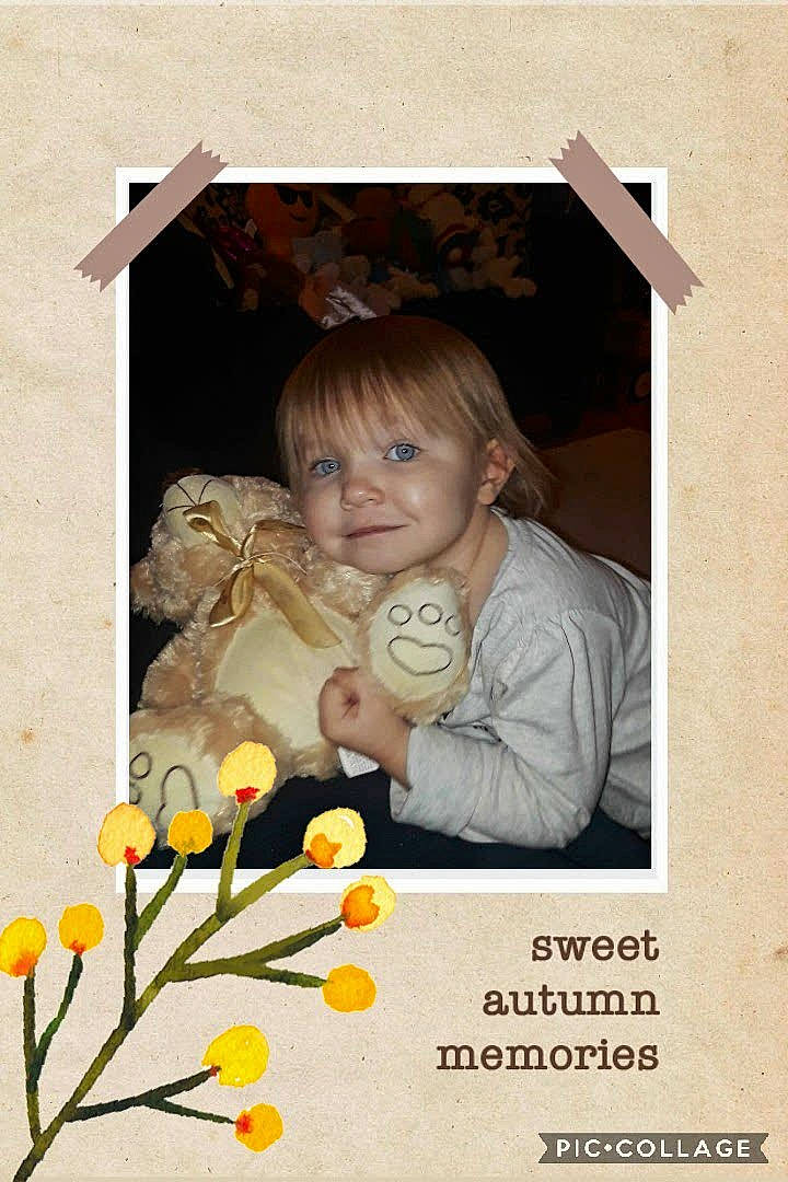 Kay is registered to the contest to win money with this photo: child, flower, girl, person, photo_caption, picture_frame, smile, toddler, yellow