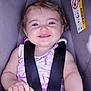 Mélyna participe au concours pour gagner de l'argent avec cette photo : baby, car_seat, child, closeup, clothing, cute, face, foot, happy, head, indoor, infant, pink, seatbelt, sitting, skin, smiling, straps, toy, young