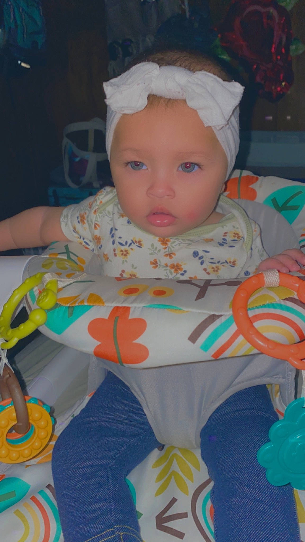 Jazlyn joined the competition — help win amazing prizes! baby, baby_products, baby_toddler_clothing, baby_toys, bib, cheek, child, fun, headwear, iris, linens, pattern, person, play, room, sitting, textile, toddler, white