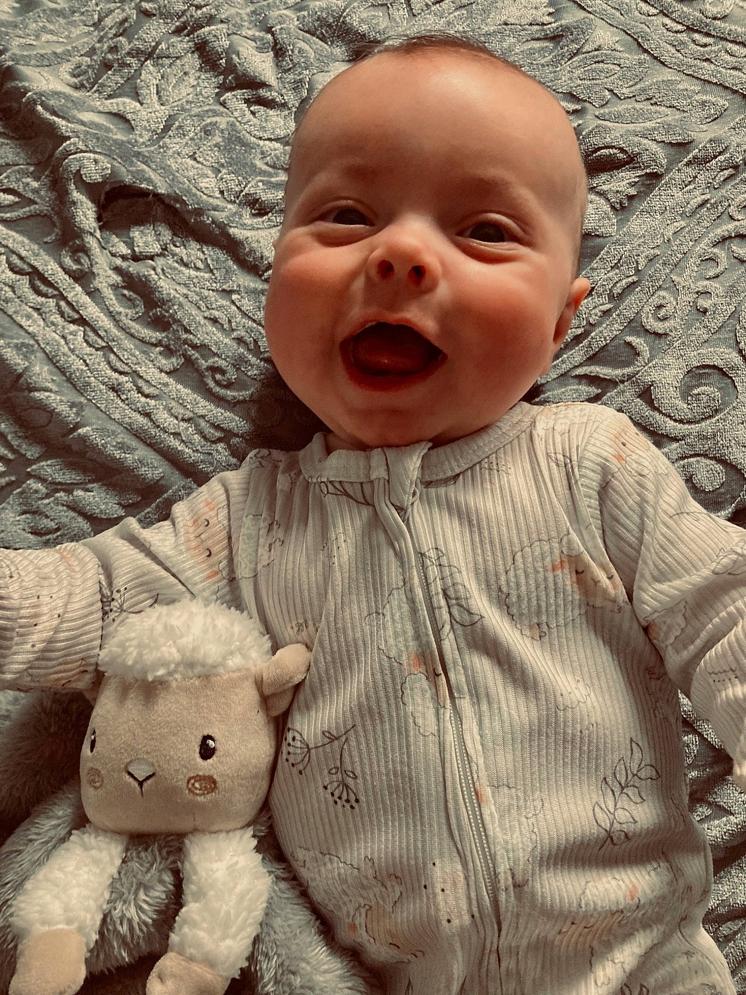 Jordan joined the competition — help win amazing prizes! baby, baby_laughing, baby_toddler_clothing, cheek, clothing, eye, grass, happy, iris, lip, mammal, nose, people_in_nature, person, skin, sleeve, smile, stuffed_toy, toddler, toy