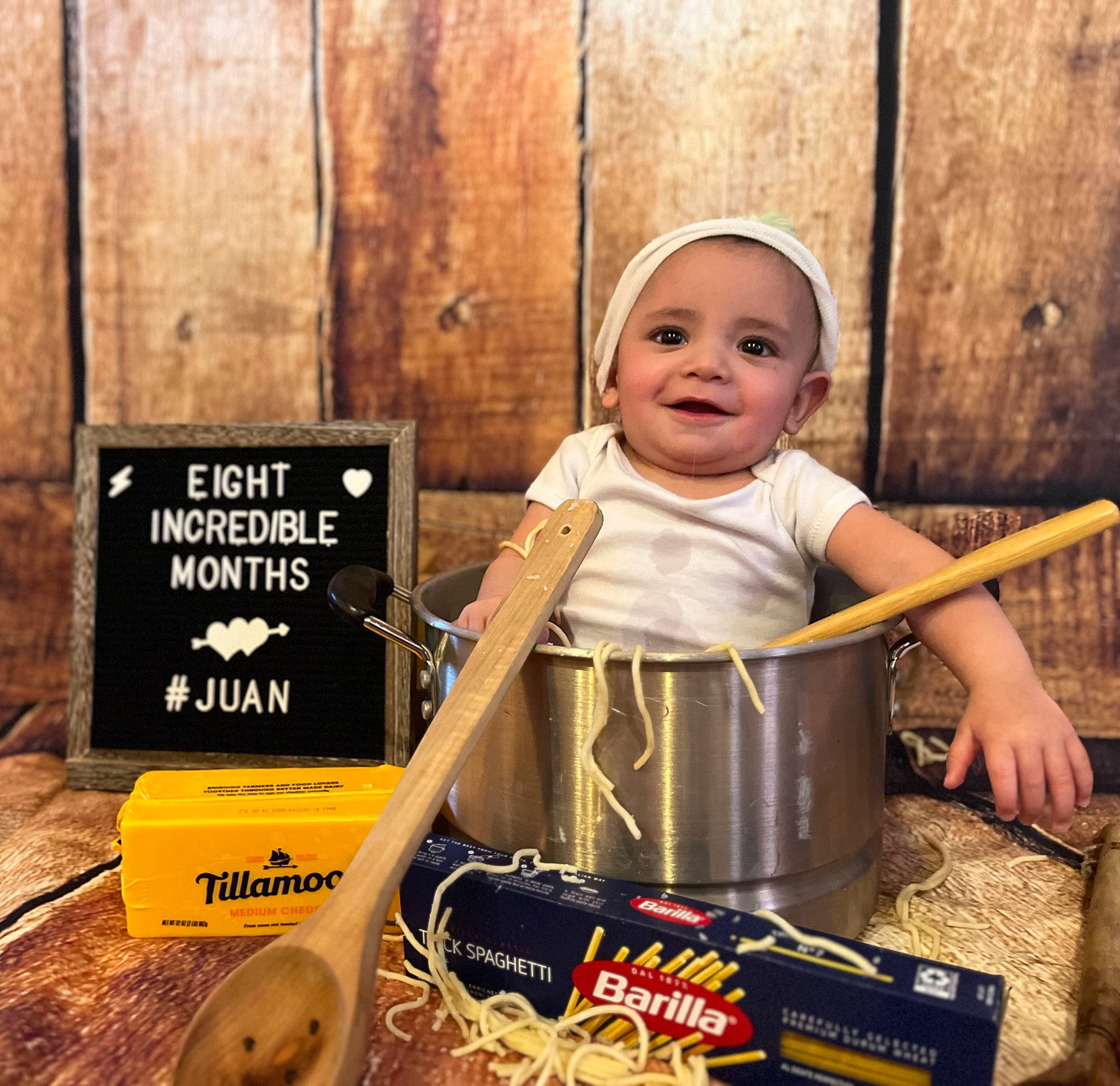 Juan is registered to the contest to win money with this photo: baby, baby_products, baby_toddler_clothing, basket, cart, child, comfort_food, flash_photography, font, happy, joy, junk_food, natural_foods, person, photo_caption, shopping_cart, sitting, smile, t_shirt, toddler
