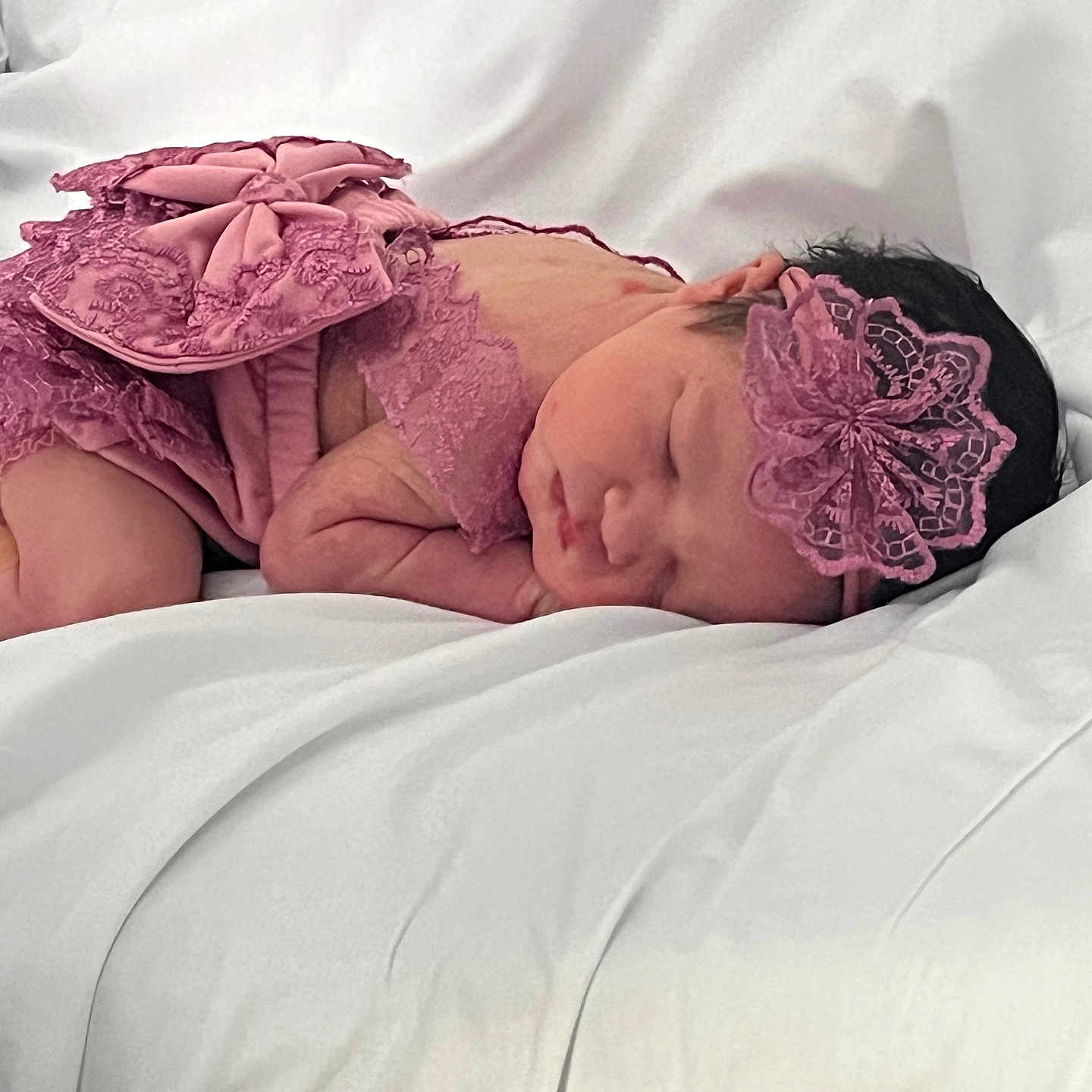 Brooklynn Julia joined the competition — help win amazing prizes! adorable, baby, baby_clothing, child, closeup, cozy, cute, delicate, headband, infancy, infant, newborn, peaceful, pink_lace, portrait, resting, sleeping, soft_blanket, tiny, white_background