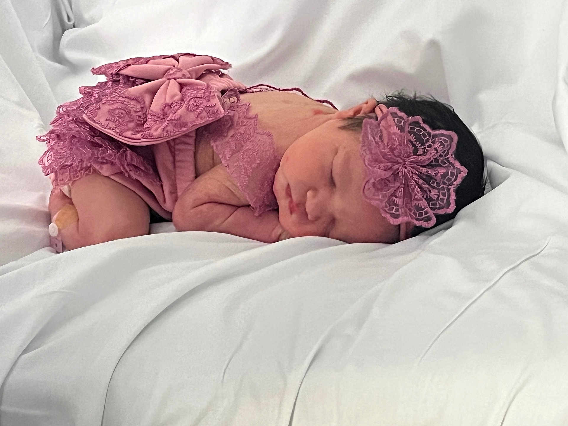 Brooklynn Julia joined the competition — help win amazing prizes! baby, newborn, sleeping, pink_lace, headband, infant, soft_blanket, white_background, peaceful, cute, portrait, resting, child, delicate, closeup, tiny, adorable, cozy, infancy, baby_clothing