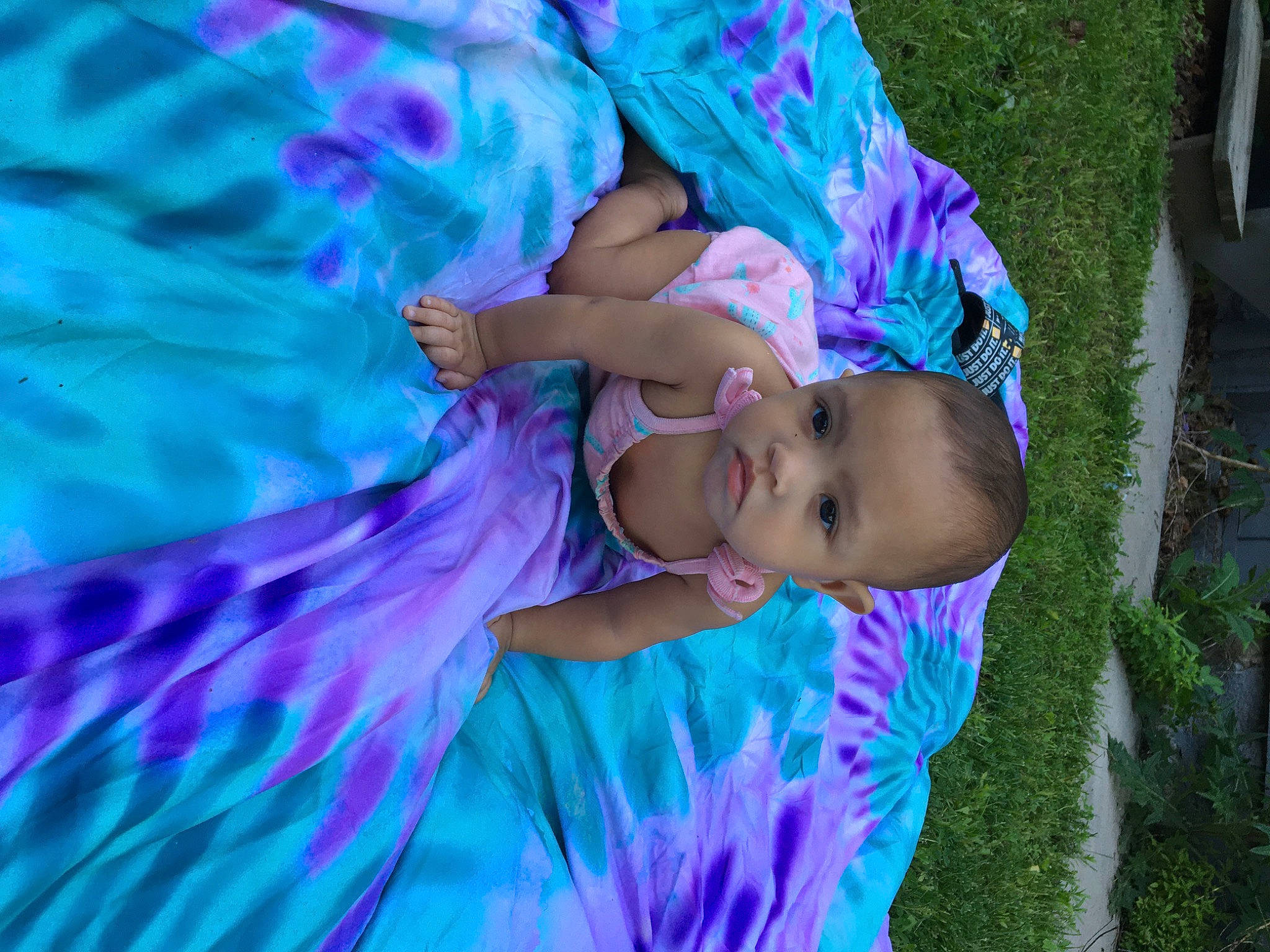 Jada is registered to the contest to win money with this photo: azure, baby, baby_toddler_clothing, child, dress, electric_blue, event, fun, grass, grassland, happy, hat, leisure, magenta, person, pink, plant, purple, toddler, tree
