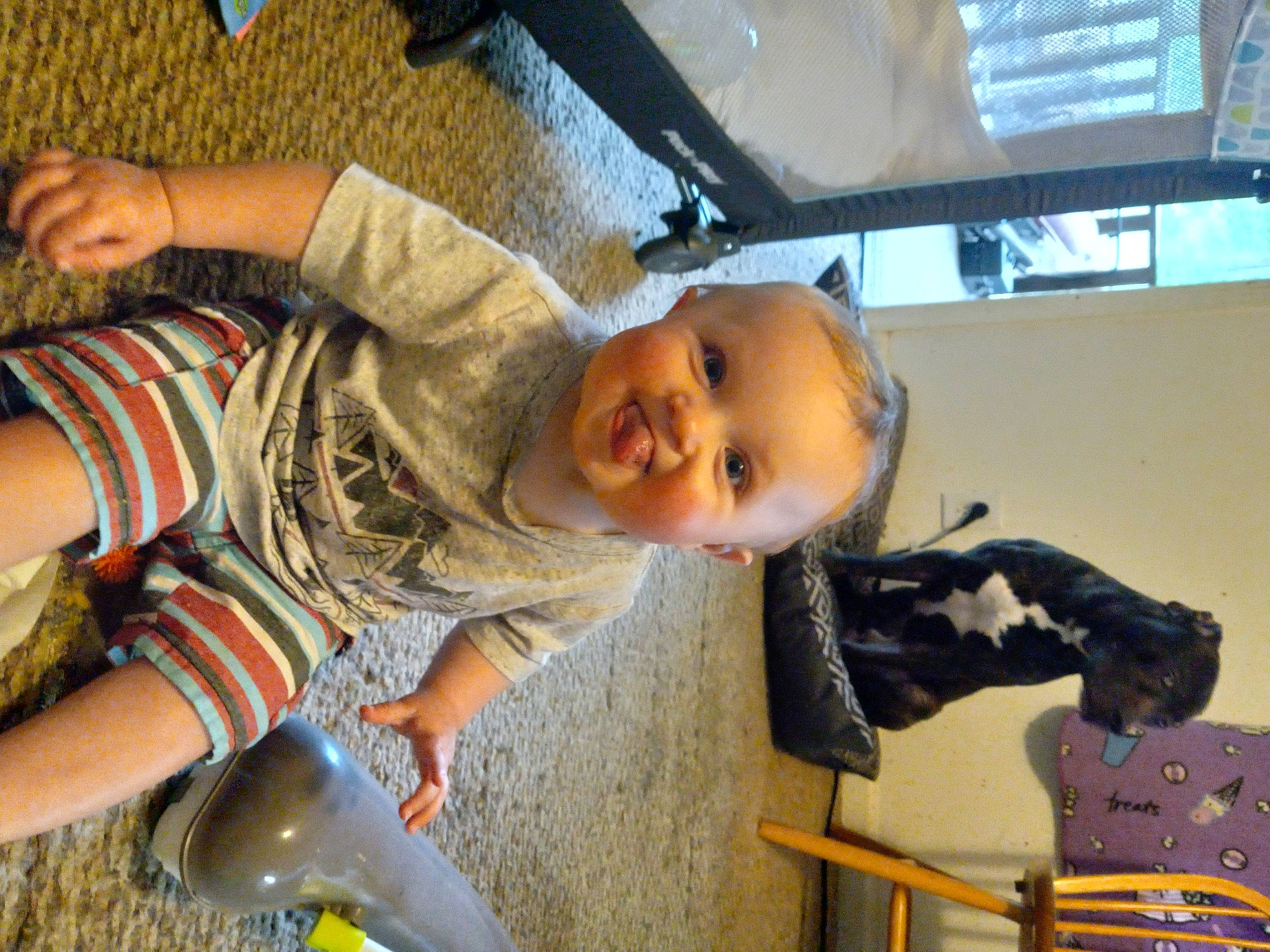 Charles joined the competition — help win amazing prizes! baby, barefoot, child, elbow, facial_expression, foot, fun, happy, human_leg, knee, leisure, pattern, person, play, sandal, sitting, smile, t_shirt, thigh, toddler