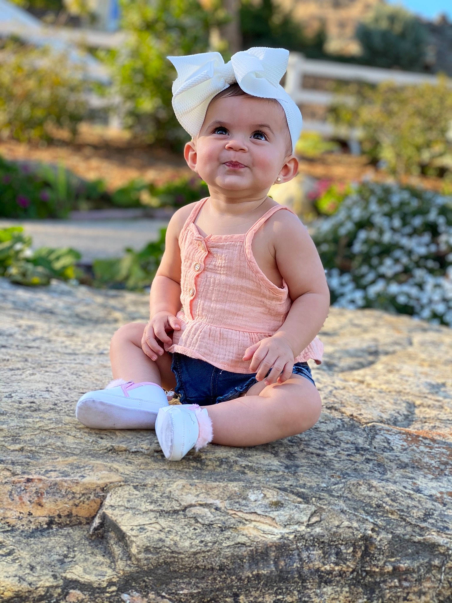 Jessica is registered to the contest to win money with this photo: baby, baby_toddler_clothing, beauty, child, flash_photography, fun, grass, happy, hat, joy, leaf, people_in_nature, person, pink, plant, sitting, skin, sleeve, summer, sunlight