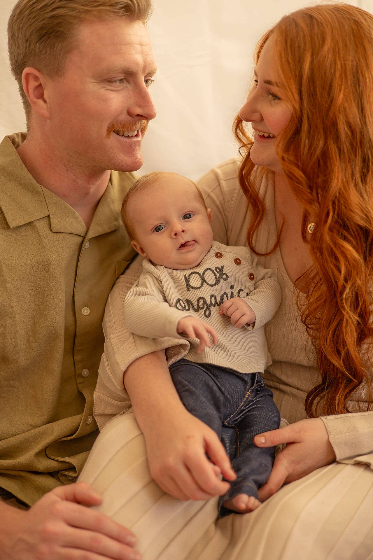 Theodore joined the competition — help win amazing prizes! adult, baby, bodypart, clothing, couch, face, finger, furniture, hand, happy, head, male, man, newborn, pants, people, person, photography, portrait, sitting