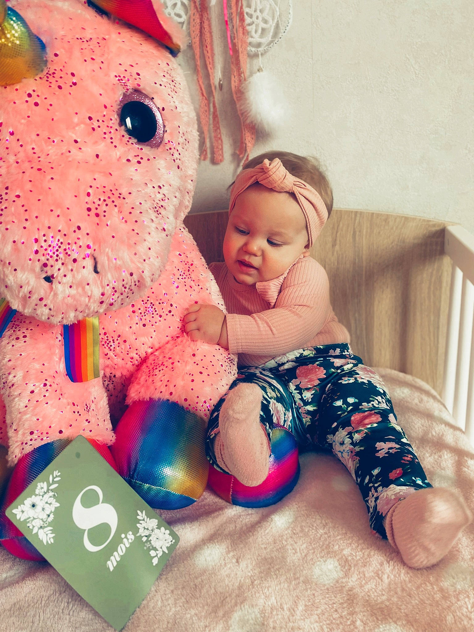 Lïyah participe au concours pour gagner de l'argent avec cette photo : baby_toddler_clothing, carmine, child, comfort, facial_expression, font, foot, fun, happy, headwear, holiday, human_leg, lap, love, people, person, sitting, smile, stuffed_toy, textile
