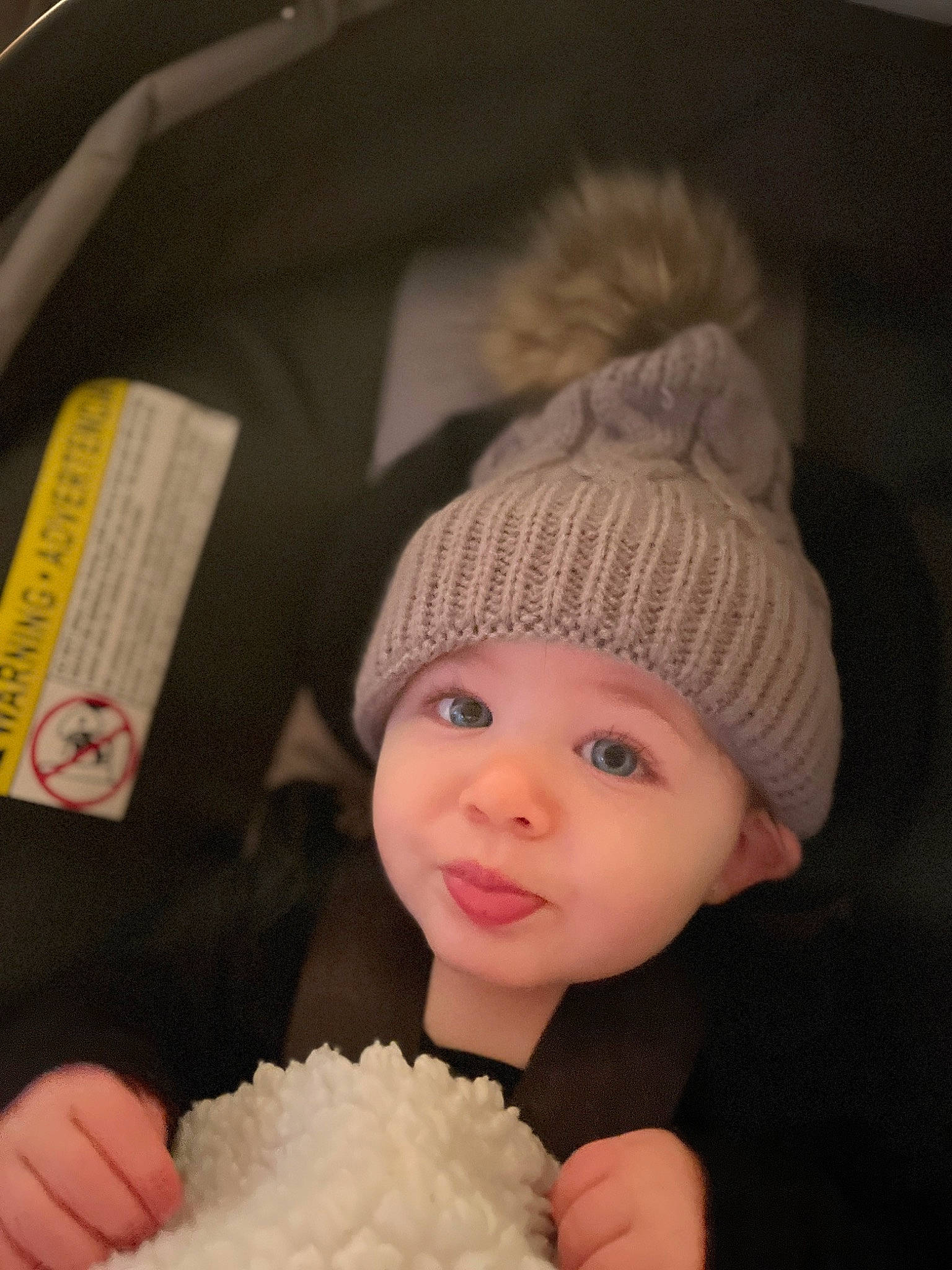 Layla joined the competition — help win amazing prizes! baby, baby_toddler_clothing, beanie, bonnet, cap, child, fashion_accessory, fur, happy, hat, headgear, headwear, human, knit_cap, nose, person, skin, smile, textile, toddler