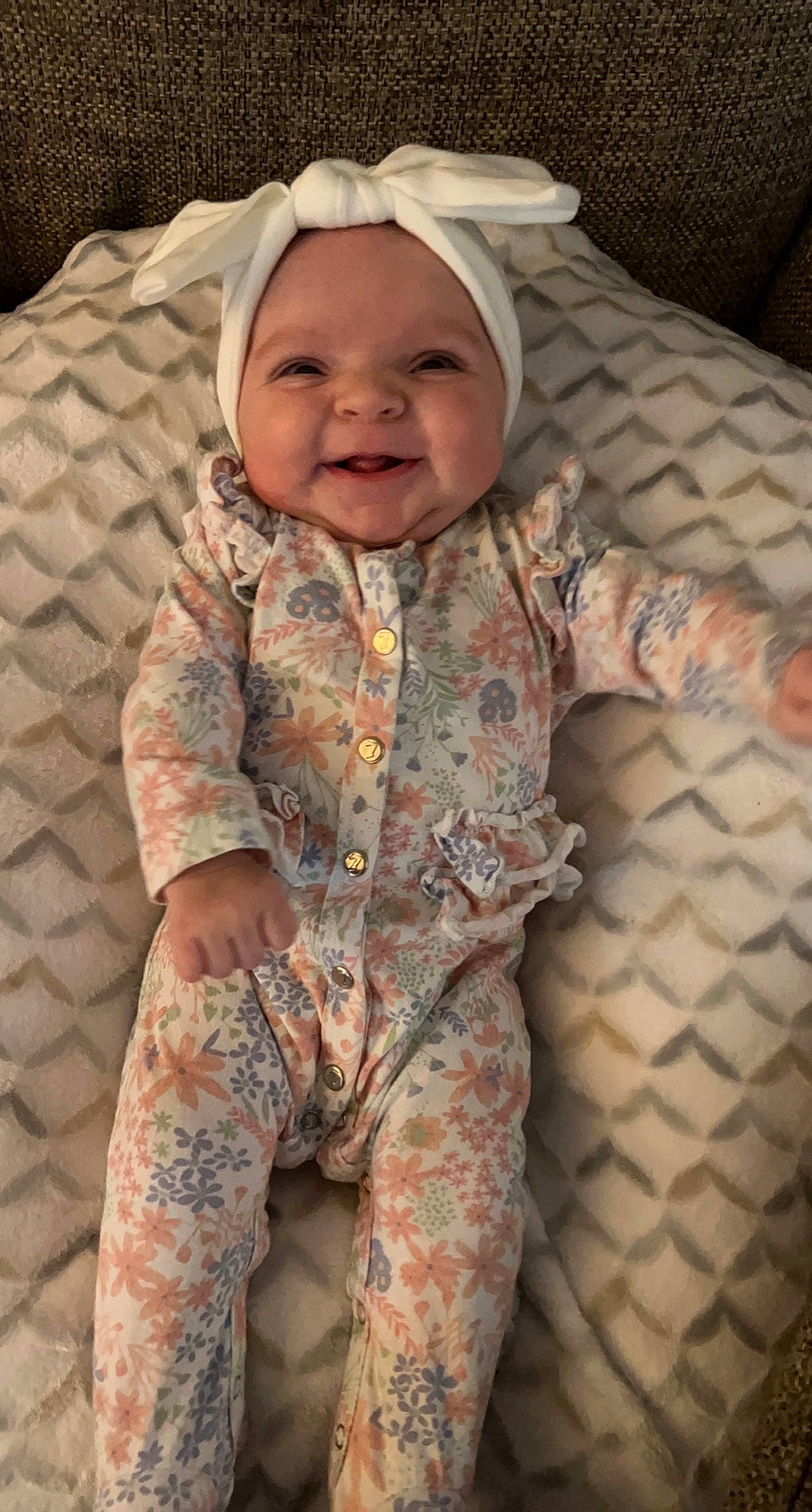 Paisley joined the competition — help win amazing prizes! baby, baby_laughing, baby_toddler_clothing, cheek, child, chin, comfort, eye, face, happy, head, headwear, joy, linens, mouth, pattern, person, pink, skin, sleeve
