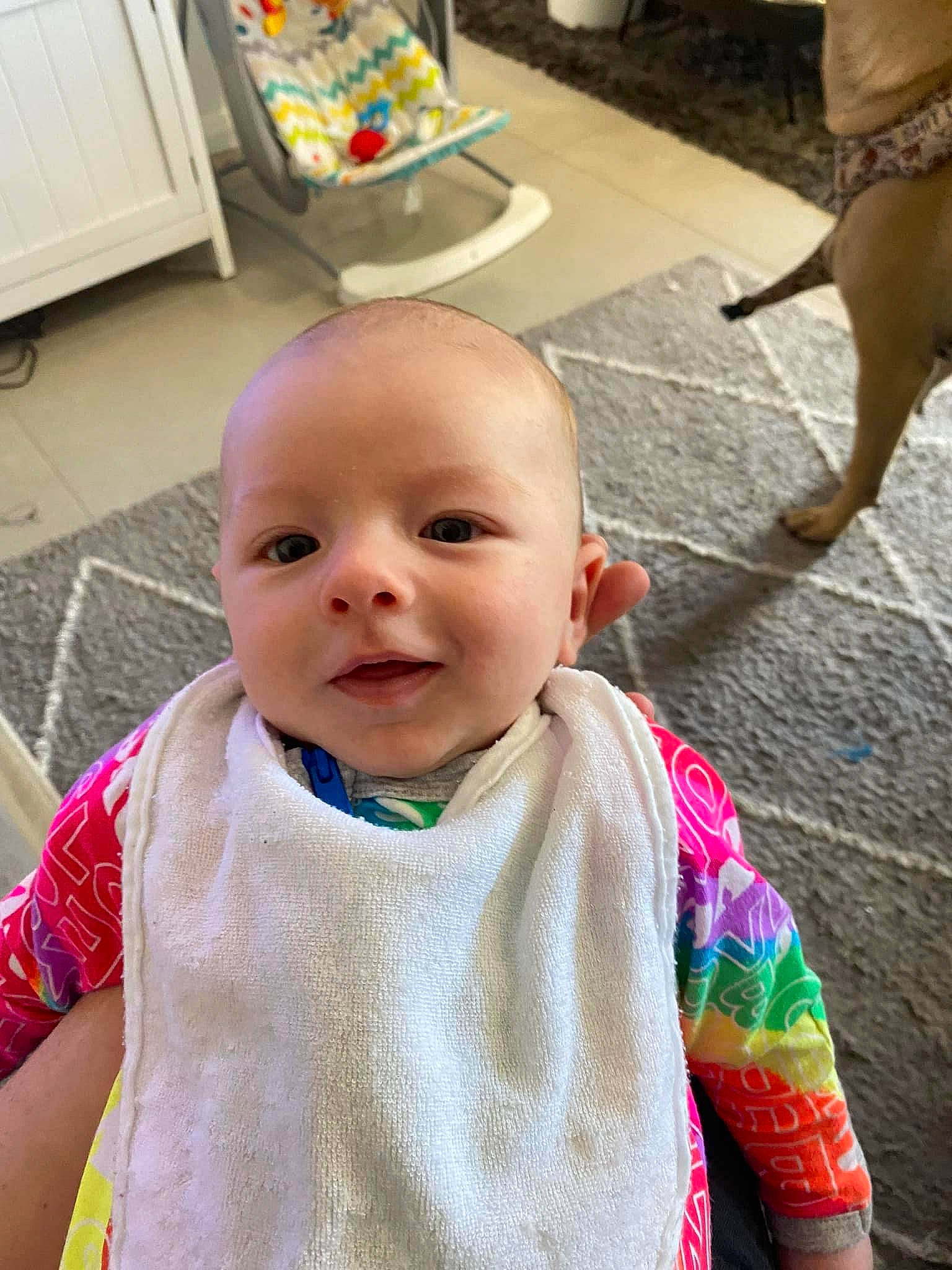 Matteo joined the competition — help win amazing prizes! baby, baby_products, baby_toddler_clothing, bib, cheek, child, dog, eye, face, flooring, happy, head, iris, person, sitting, skin, sleeve, smile, t_shirt, toddler