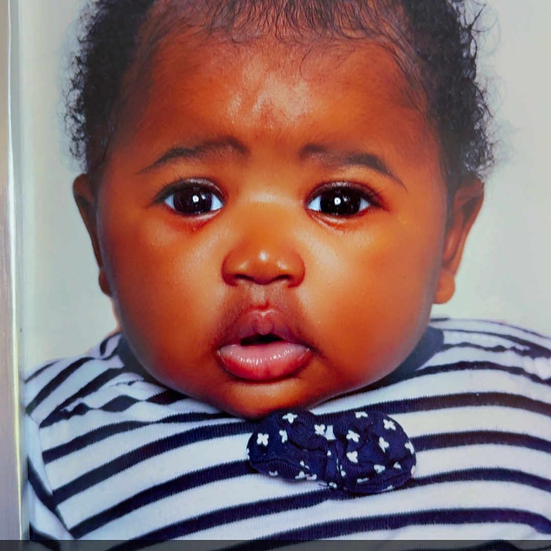 Saïd Maëlysa a rejoint le concours — aidez-le/la à gagner de superbes lots ! baby, bow_tie, child, close_up, cute, expression, eyes, face, frame, hair, indoor, infant, mouth, person, photograph, portrait, skin, striped_clothing, text_overlay, young