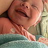 Freya joined the competition — help win amazing prizes! baby, smiling, blanket, infant, happy, face, skin, person, clothing, tattoo, hand, sleeping, cute, newborn, portrait, cozy, soft, closeup, resting, relaxed