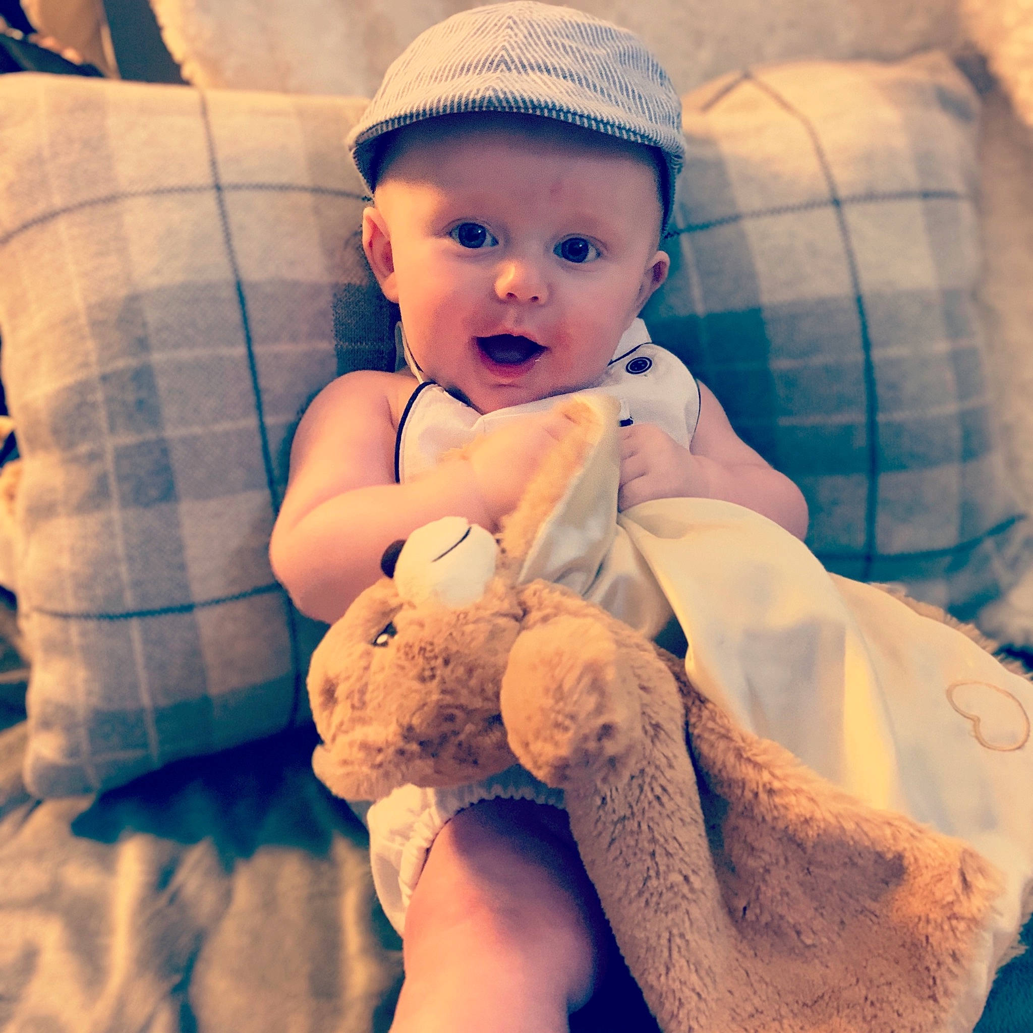 Calum joined the competition — help win amazing prizes! arm, baby, cheek, child, cloud, eye, face, finger, hand, happy, headgear, human, person, product, skin, sky, smile, surprise, teddy_bear, textile