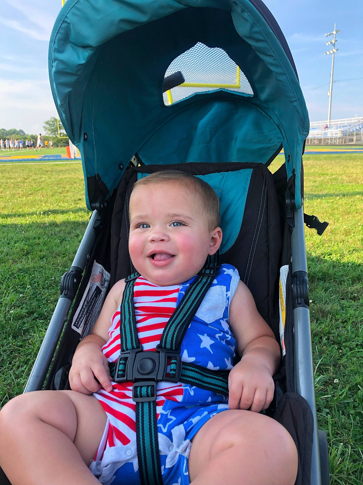 Memphis joined the competition — help win amazing prizes! baby_carriage, baby_toddler_clothing, blue, cloud, electric_blue, fun, green, happy, joy, lap, leisure, people, people_in_nature, person, photograph, product, recreation, sky, smile, toddler
