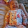 Raelynn joined the competition — help win amazing prizes! baby, infant, child, smiling, lying_down, bed, blanket, pajamas, colorful_clothing, portrait, indoors, bedroom, happy, face, head, eyes, mouth, bedding, casual_photo, smartphone_screenshot