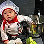 Ayssem participe au concours pour gagner de l'argent avec cette photo : baby, chef_hat, baby_chef, kitchen, pot, vegetables, broccoli, lettuce, green_pepper, cooking_utensils, baby_clothing, white_socks, countertop, curious_expression, black_pants, red_scarf, cooking, food, indoor, cute