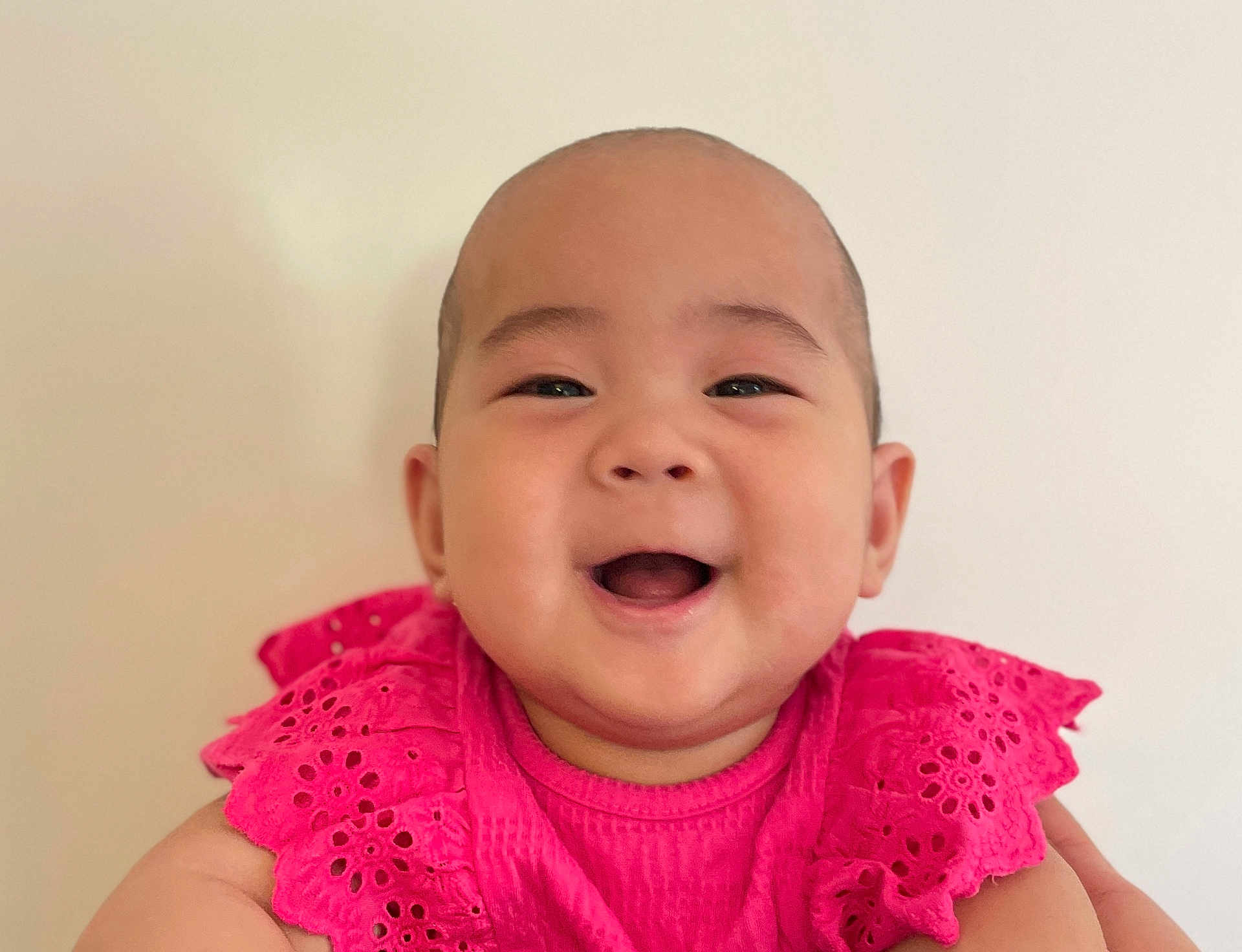 Aurora joined the competition — help win amazing prizes! baby, smiling, child, portrait, pink_dress, happy, face, cute, infant, closeup, innocent, cheerful, bright, young_child, person, studio, candid, joyful, fashion, expression