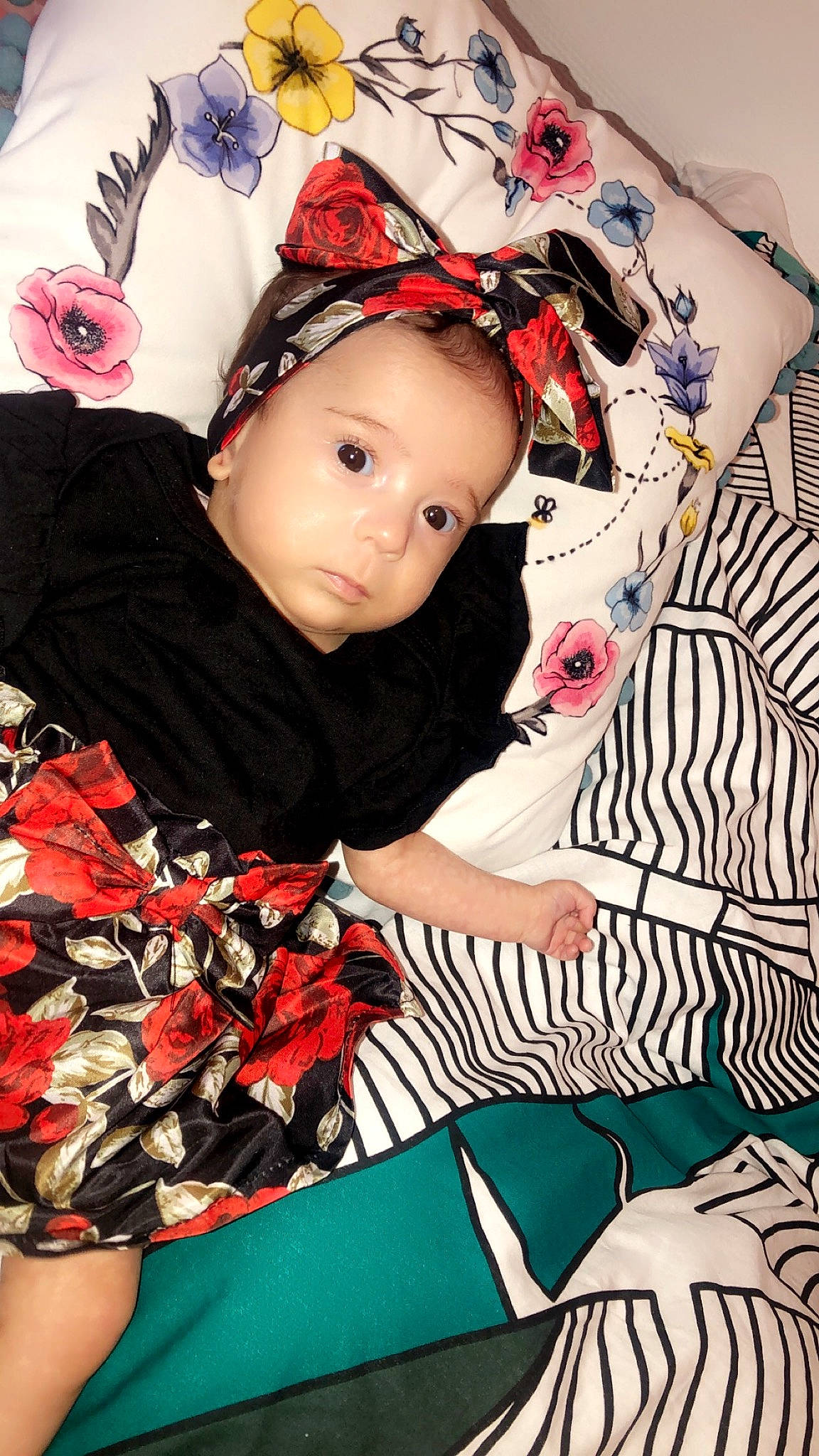 Angelina participe au concours pour gagner de l'argent avec cette photo : baby, baby_toddler_clothing, cap, carmine, cheek, child, doll, fashion_accessory, linens, lip, magenta, pattern, person, petal, pink, red, sleeve, textile, toddler, toy