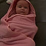 baby, pink, towel, hood, ears, wrapped, infant, face, cute, child, soft, blanket, portrait, lying_down, indoors, warm, cozy, newborn, person, skin