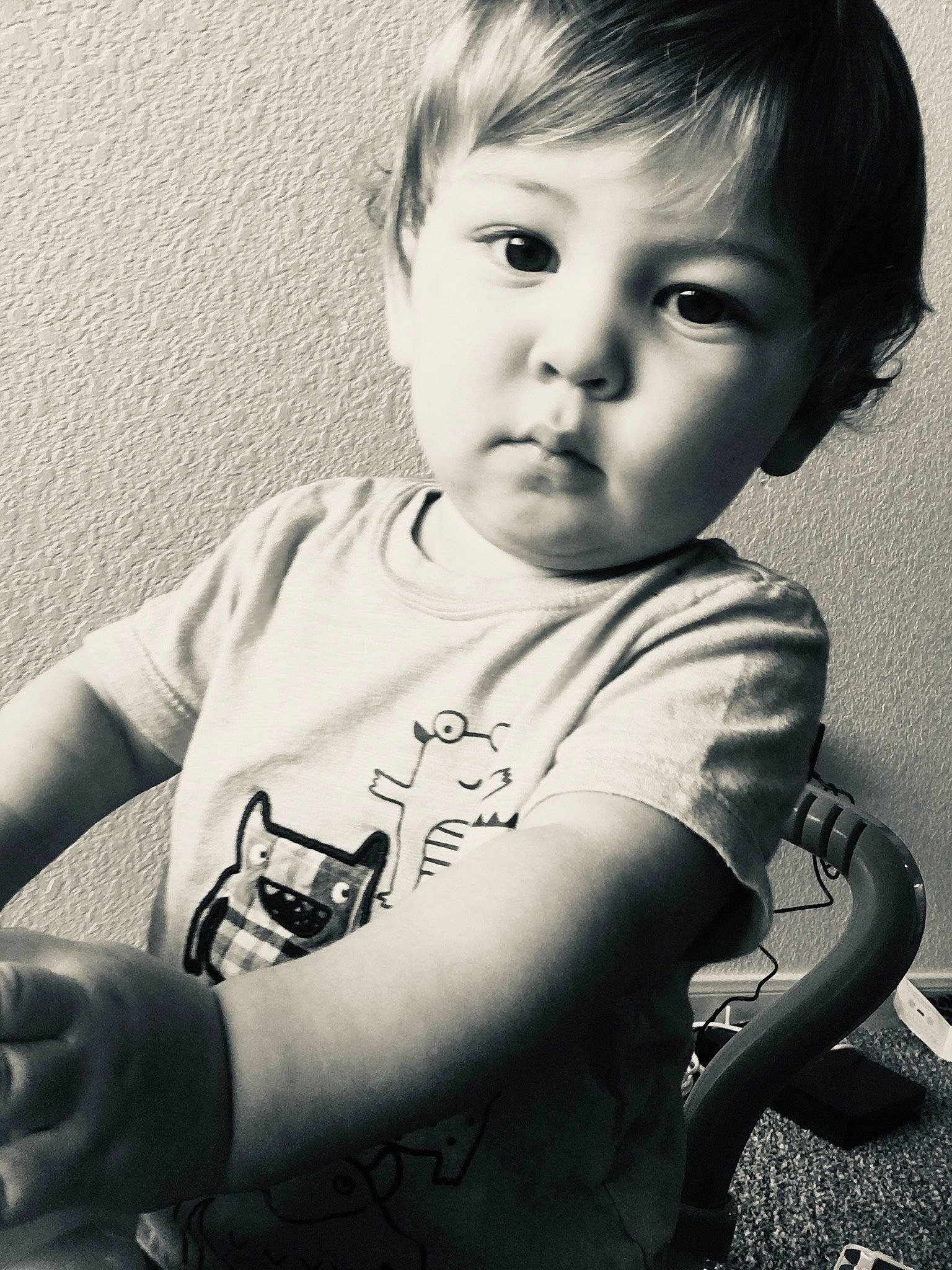 Isaiah is registered to the contest to win money with this photo: arm, black_and_white, cheek, chin, eye, face, flash_photography, forehead, gesture, hair, hairstyle, hand, happy, head, neck, nose, person, shoulder, skin, sleeve