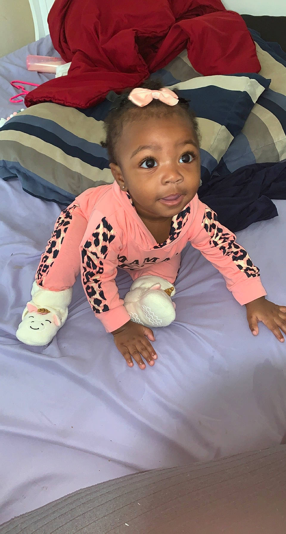 Janiyah is registered to the contest to win money with this photo: baby, baby_toddler_clothing, cheek, child, elbow, face, finger, fun, gesture, happy, head, leisure, linens, person, play, room, sitting, skin, sleeve, t_shirt