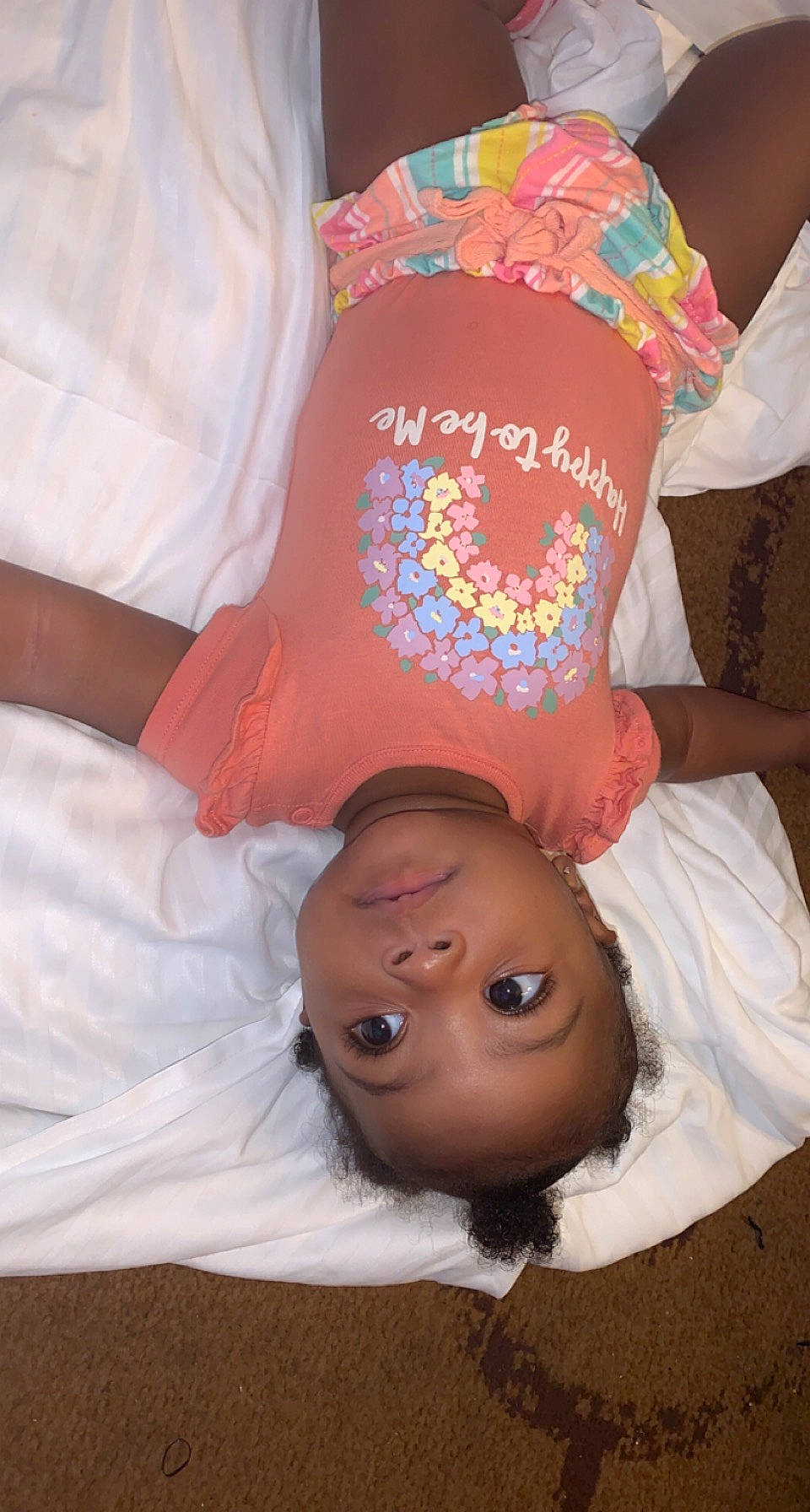 Janiyah joined the competition — help win amazing prizes! abdomen, baby, baby_toddler_clothing, cheek, child, comfort, eye, facial_expression, finger, gesture, hand, happy, hat, human, human_body, mouth, nose, person, skin, t_shirt