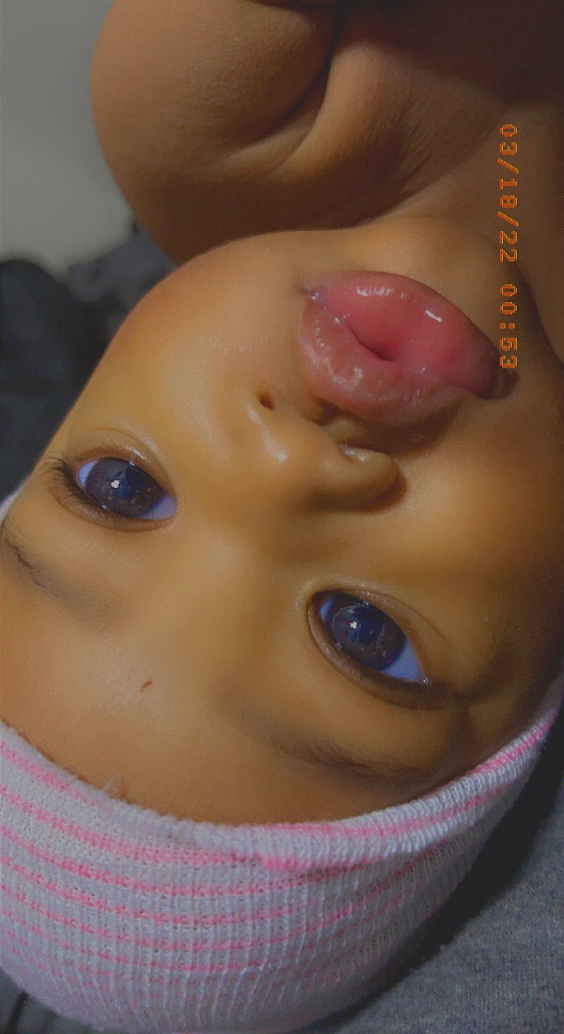 Harmonie is registered to the contest to win money with this photo: arm, cheek, chin, eye, eyebrow, eyelash, face, forehead, hair, hand, head, human_body, jaw, joint, lip, mouth, neck, nose, skin, toy