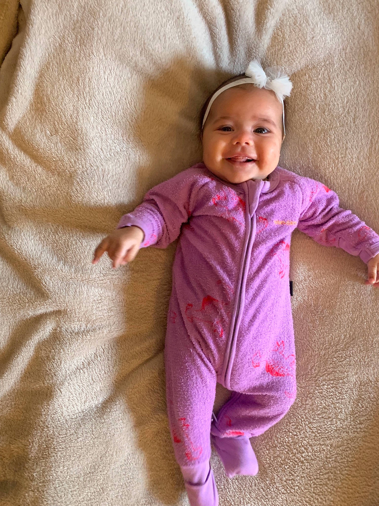 Kaliah joined the competition — help win amazing prizes! baby, baby_products, baby_toddler_clothing, child, face, head, joy, linens, outerwear, person, pink, product, skin, sleeve, smile, textile, toddler