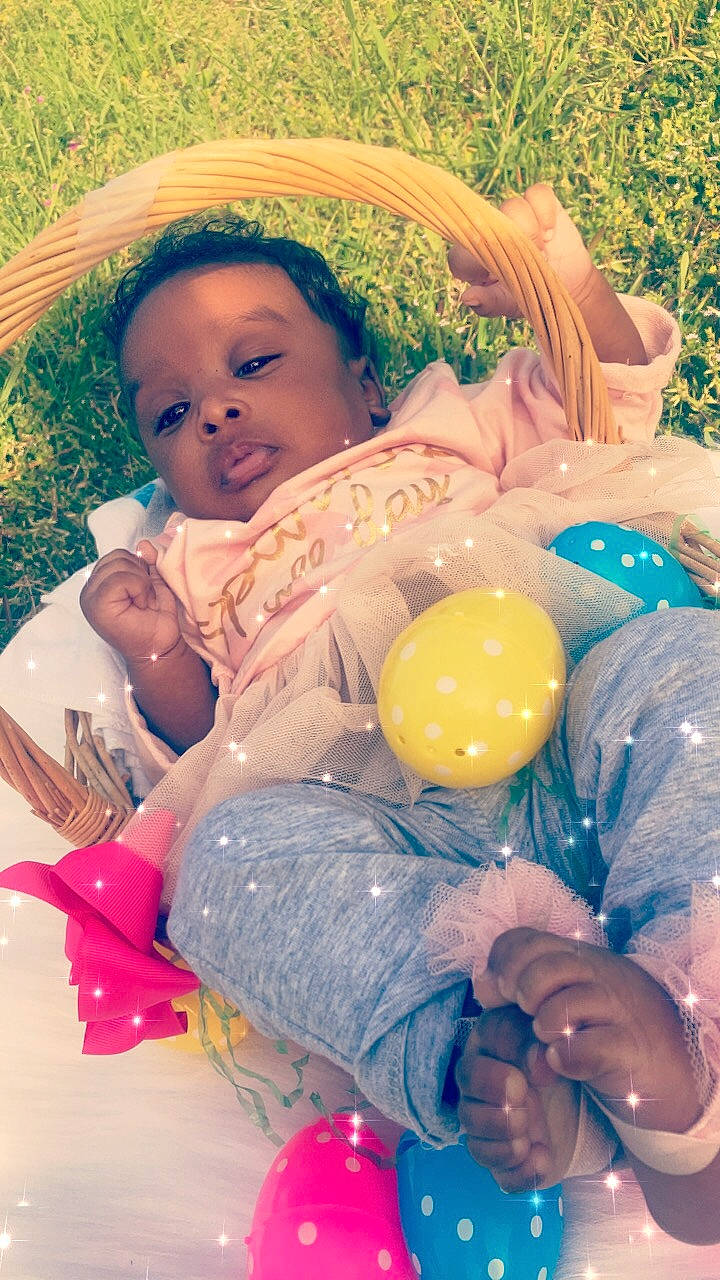 Kamya joined the competition — help win amazing prizes! baby, baby_products, balloon, child, fun, grass, happy, person, pink, play, product, recreation, skin, smile, toddler, yellow