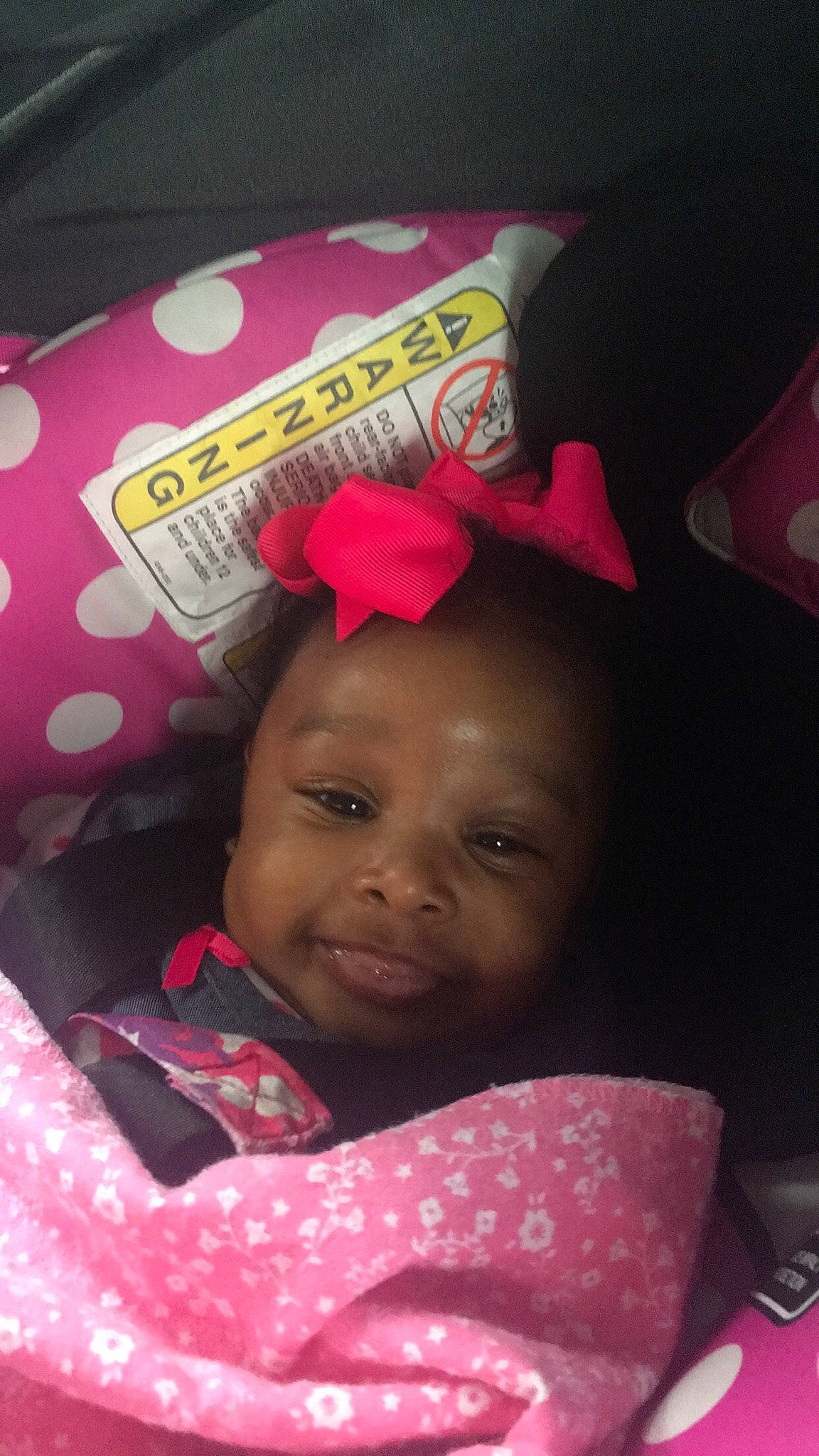 Kamya is registered to the contest to win money with this photo: baby, cheek, child, hair_accessory, head, lip, magenta, person, pink, skin, smile, toddler