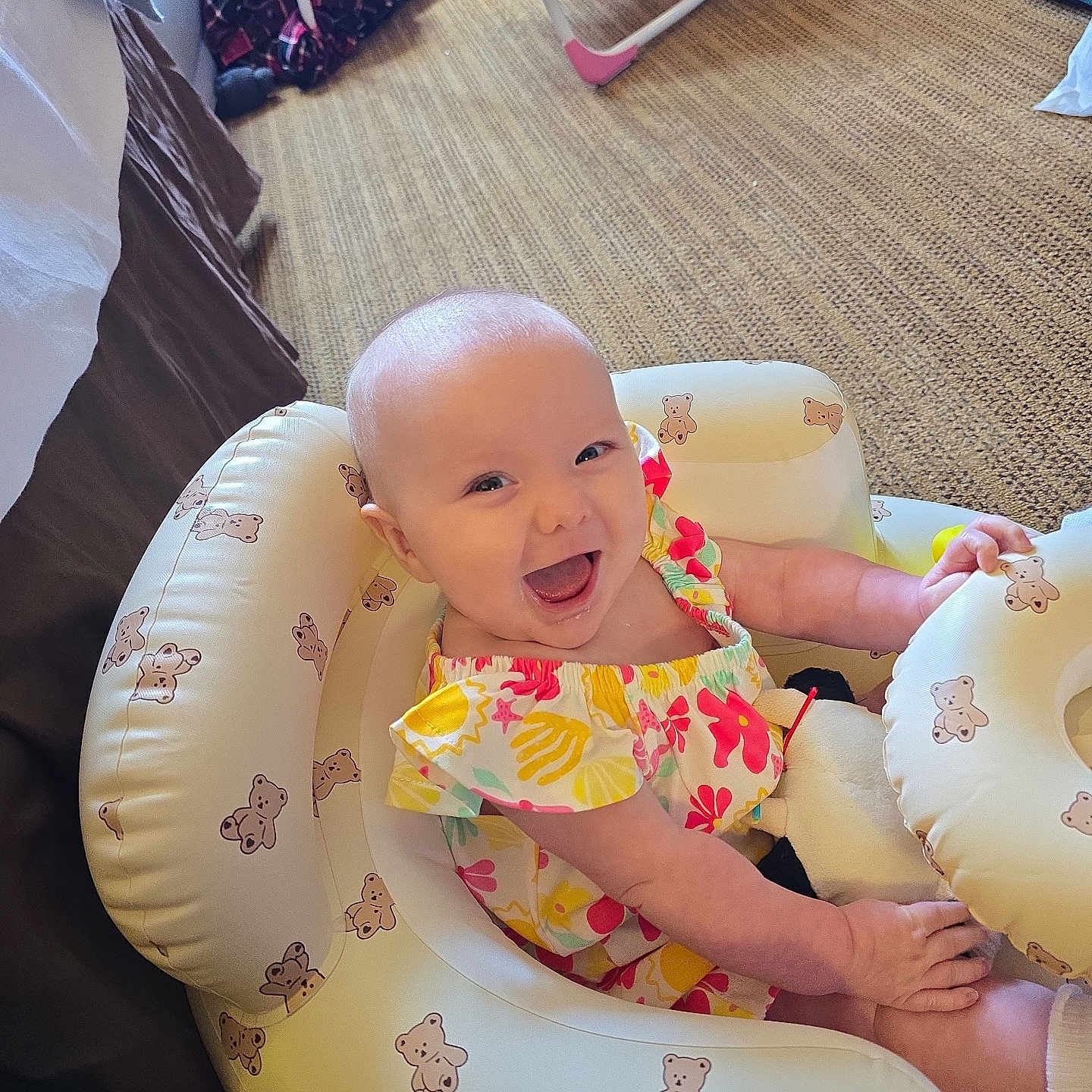 Renesmee joined the competition — help win amazing prizes! baby, baby_girl, bright, carpet, cheerful, child, colorful_clothing, comfort, cute, happy, home, indoor, infant, inflatable_seat, playtime, sitting, smiling, teddy_bear_pattern, toy, young_child