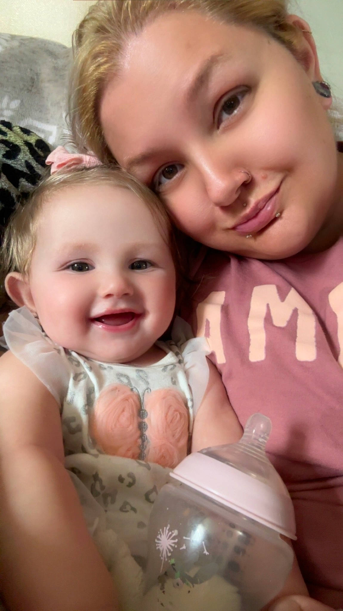 Natalie is registered to the contest to win money with this photo: cheek, child, chin, eye, eyebrow, facial_expression, finger, fun, gesture, happy, head, interaction, iris, joy, lip, mouth, nose, person, pink, skin