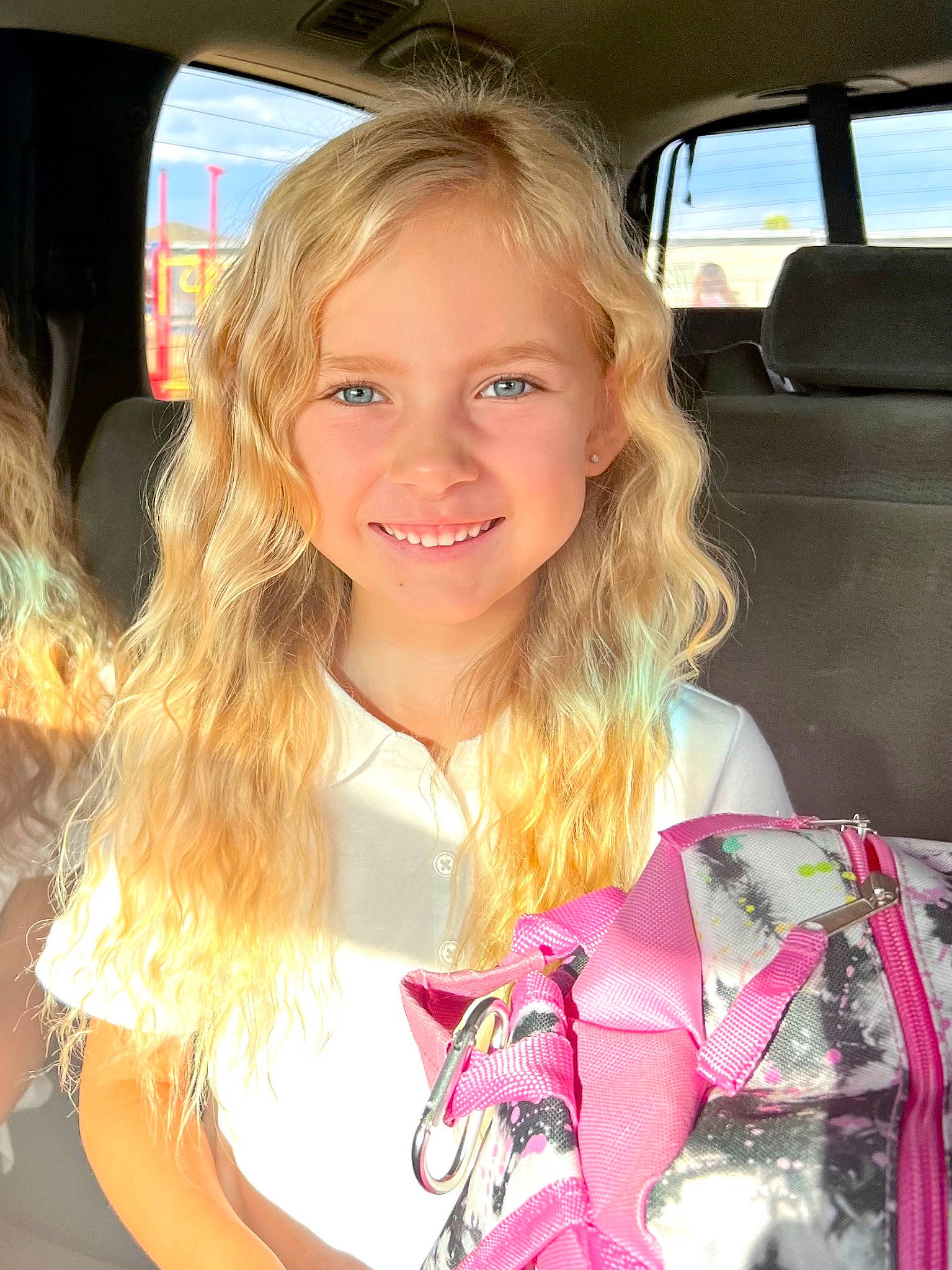 Malibu joined the competition — help win amazing prizes! auto_part, beauty, blond, brown_hair, car, car_seat, chin, fun, happy, iris, joy, lip, long_hair, motor_vehicle, person, pink, plant, skin, smile, t_shirt