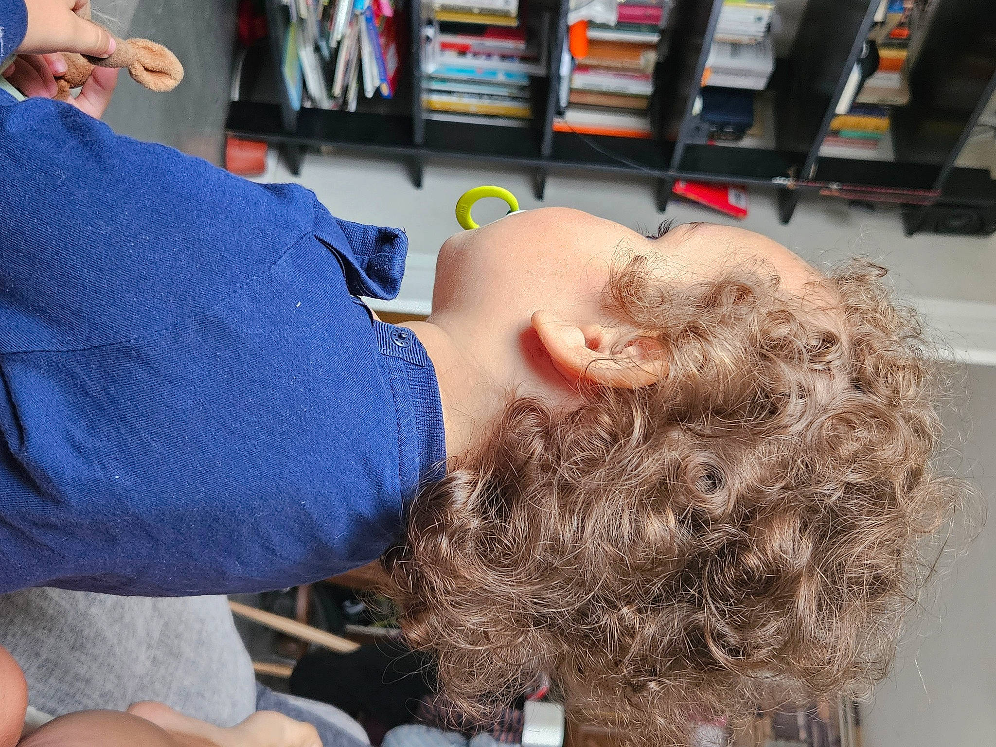 Tyler participe au concours pour gagner de l'argent avec cette photo : beard, bookcase, child, electric_blue, eyelash, eyewear, fun, fur, hair_coloring, happy, leisure, long_hair, neck, pattern, person, selfie, shelf, shelving, sitting